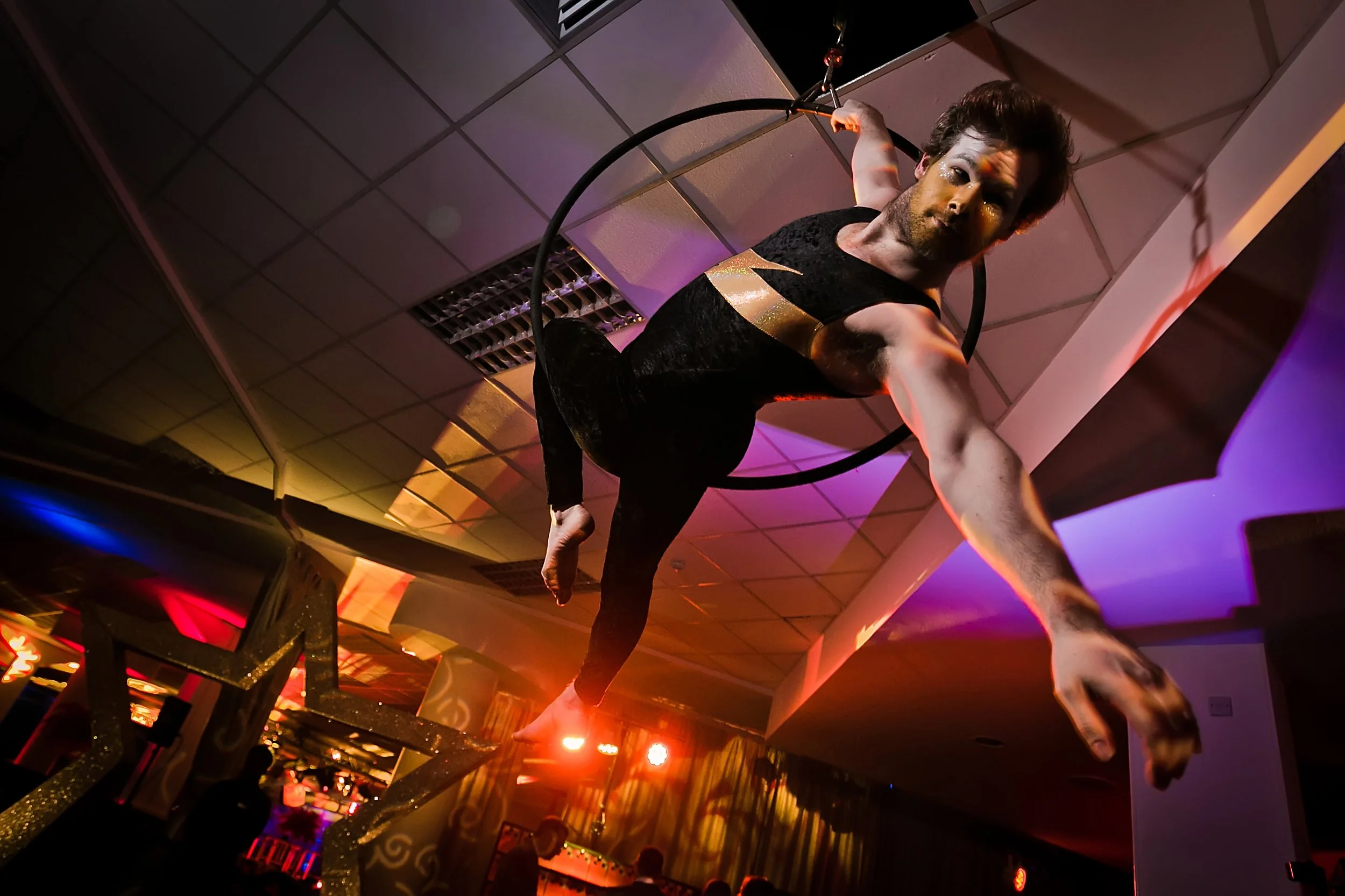 Aerial performer entertaining guests at a corporate awards dinner