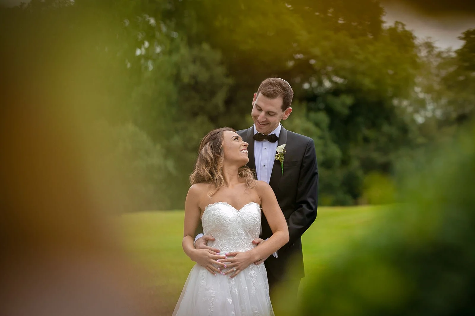 Intimate couple portrait in soft garden light at The Mere Golf Resort Cheshire
