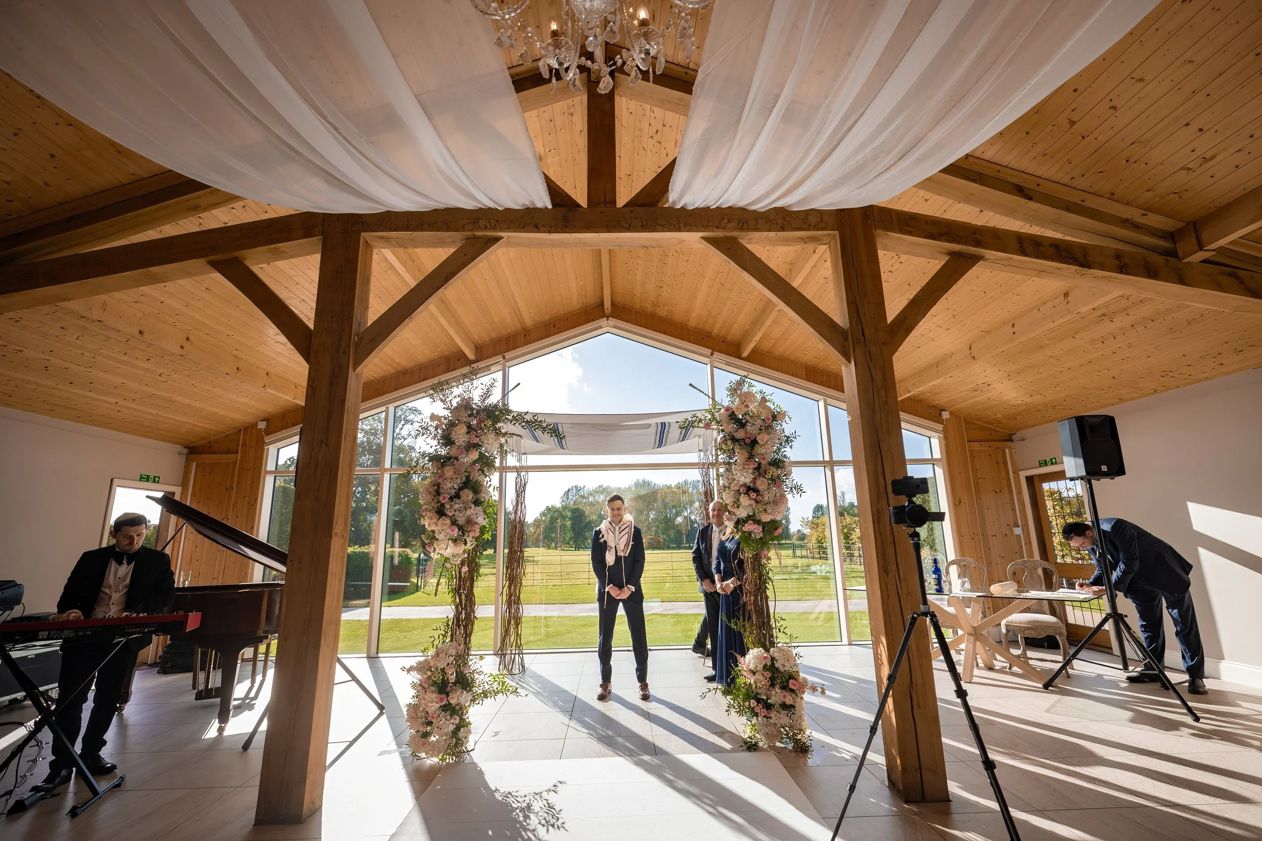 Groom waits for bride at wedding ceremony at Merrydale Manor.