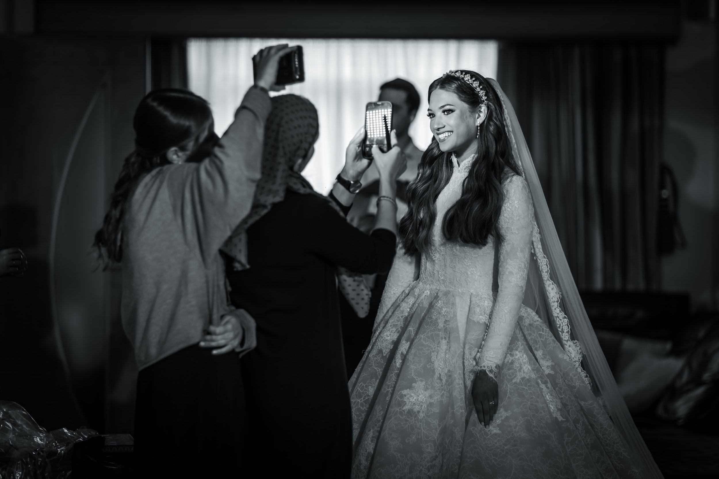 kallah bride photographed by friends during prep at charedi wedding