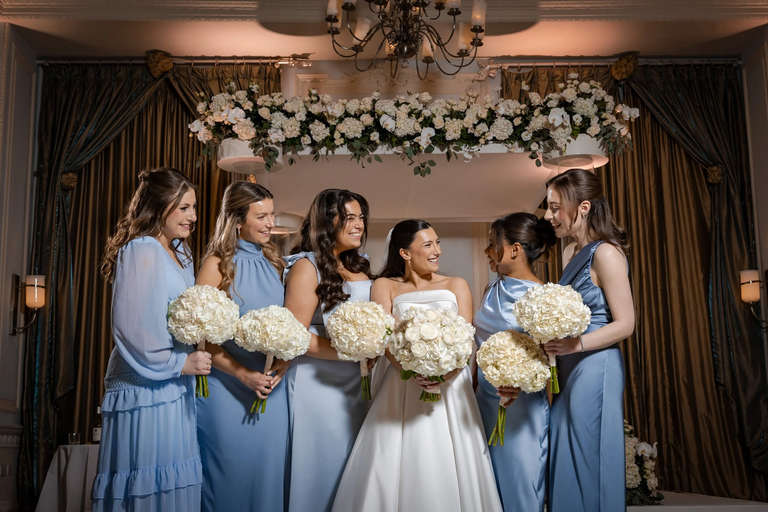 bride and bridesmaids portrait in trafford suite at midland hotel