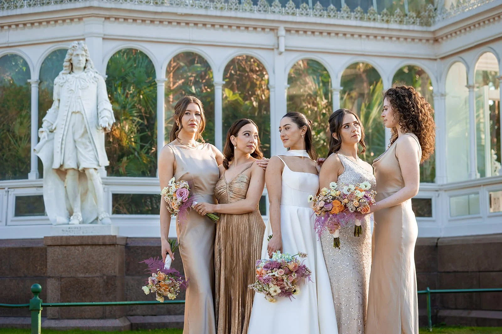 bride and bridesmaids portrait at sefton park palm house in liverpool