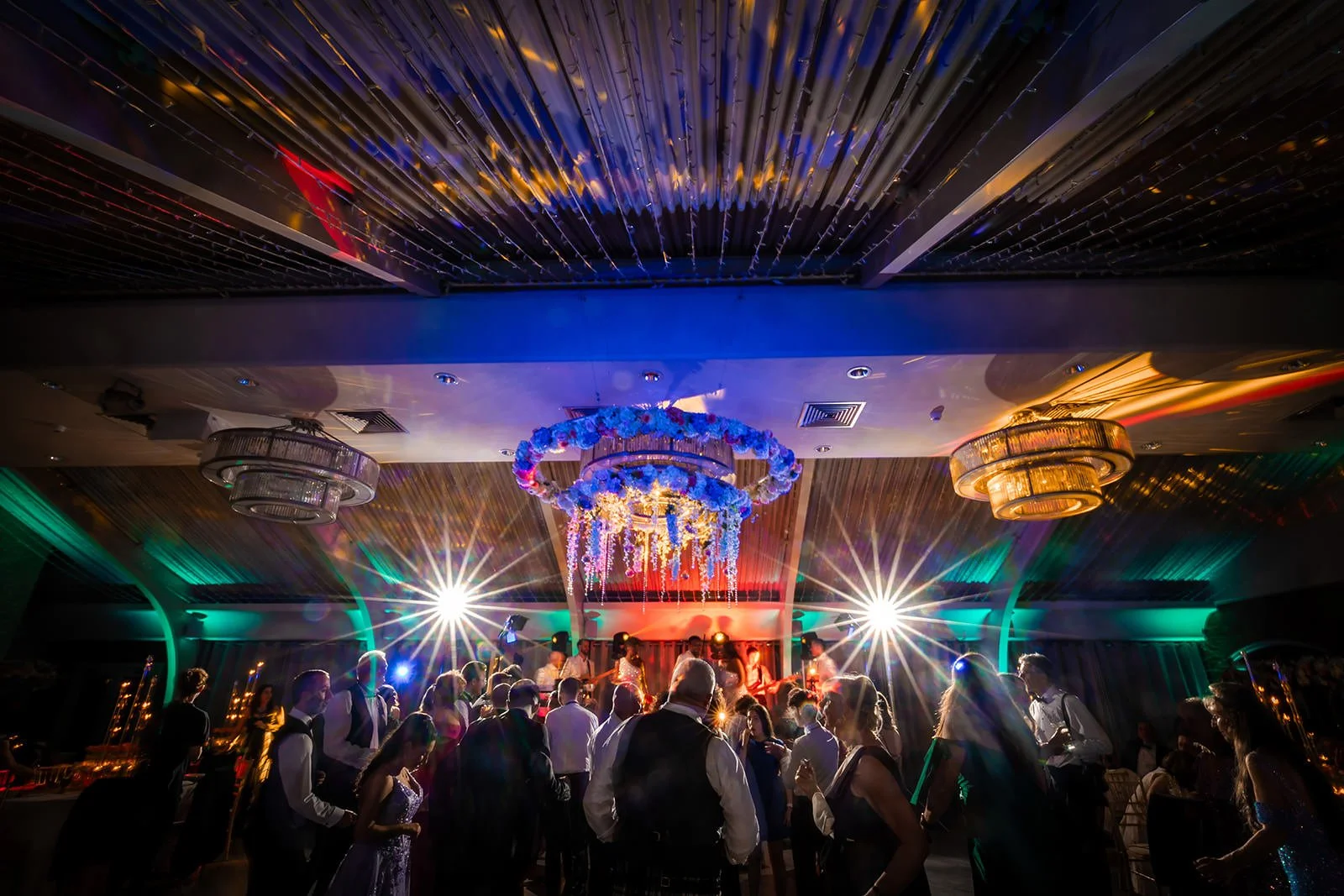 atmospheric crowd shot during wedding reception dancing at colshaw hall in cheshire