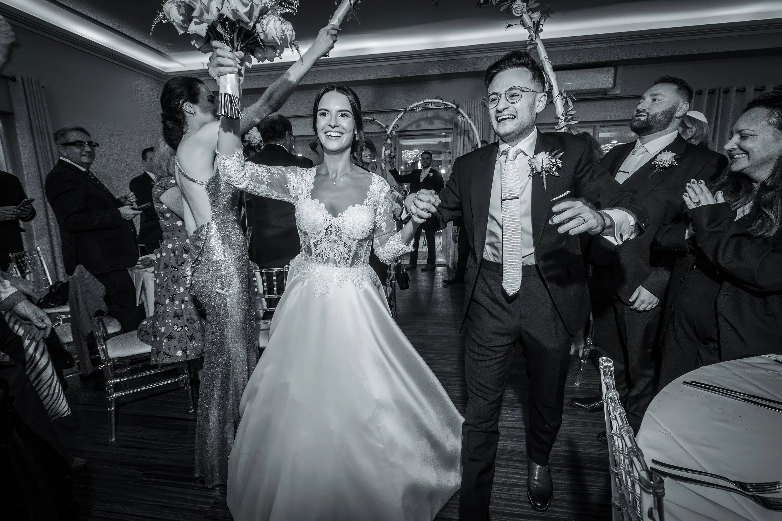 Merrydale Manor wedding reception guests celebrating with bride and groom – wedding photography North West