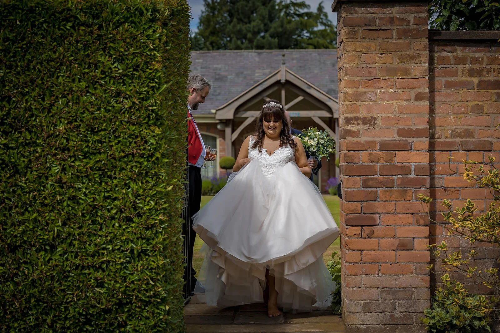 bride walking the grounds of Colshaw hall in cheshire
