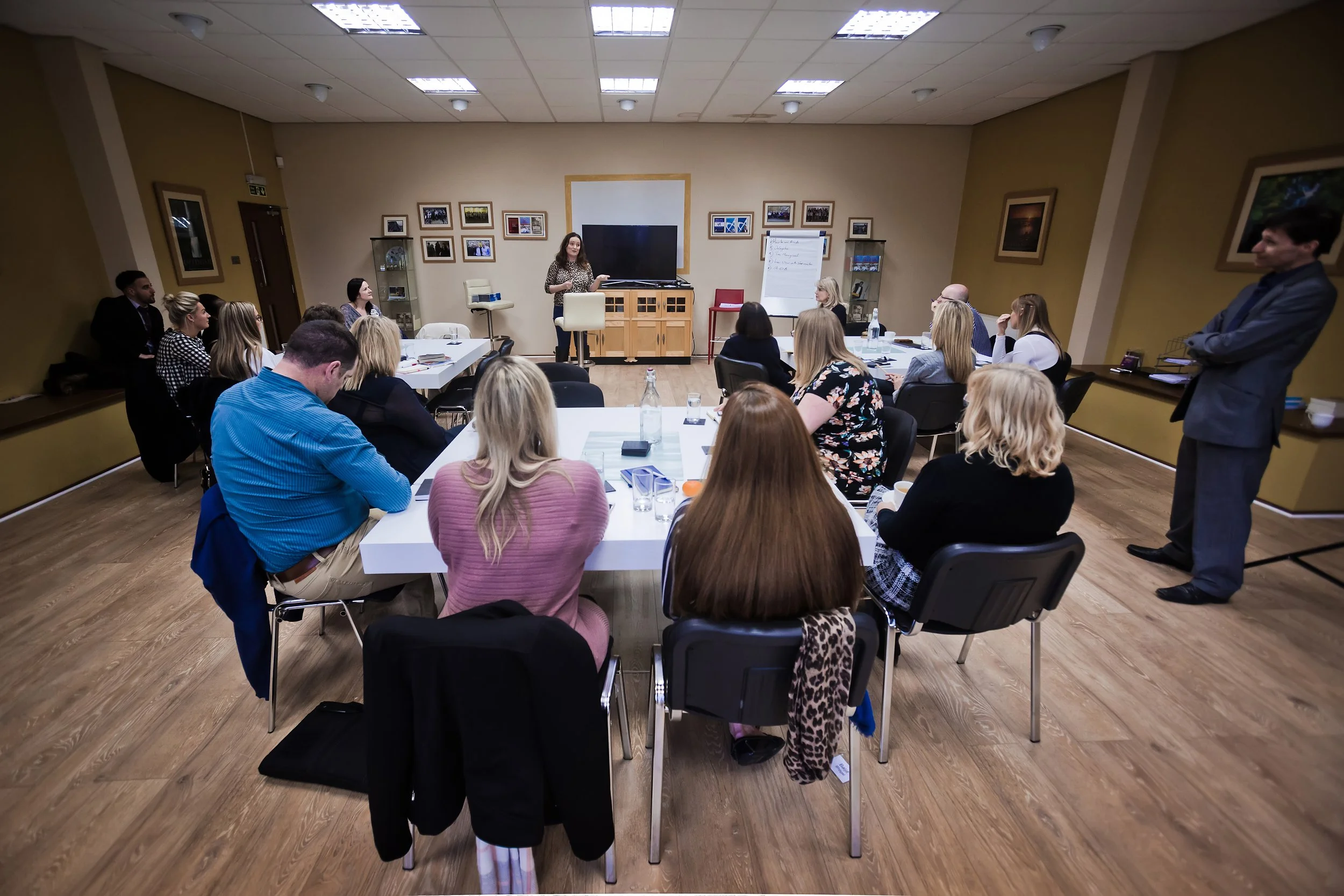 Delegates attending a professional business workshop in Manchester