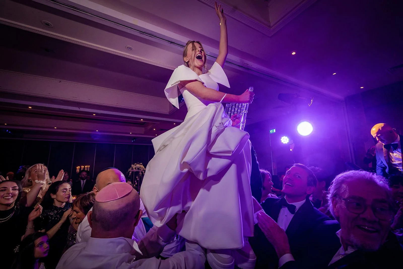 Hora chair dance during Jewish wedding celebration at The Mere Knutsford

