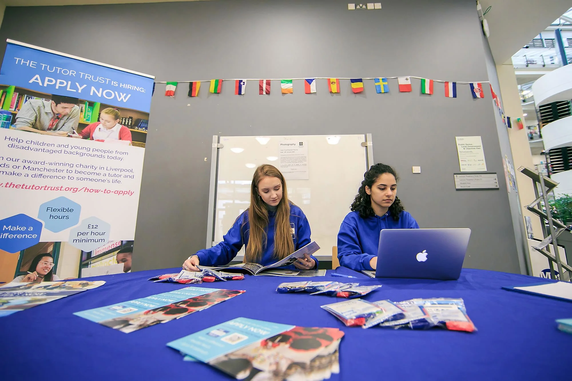 Event registration and information desk at a networking event