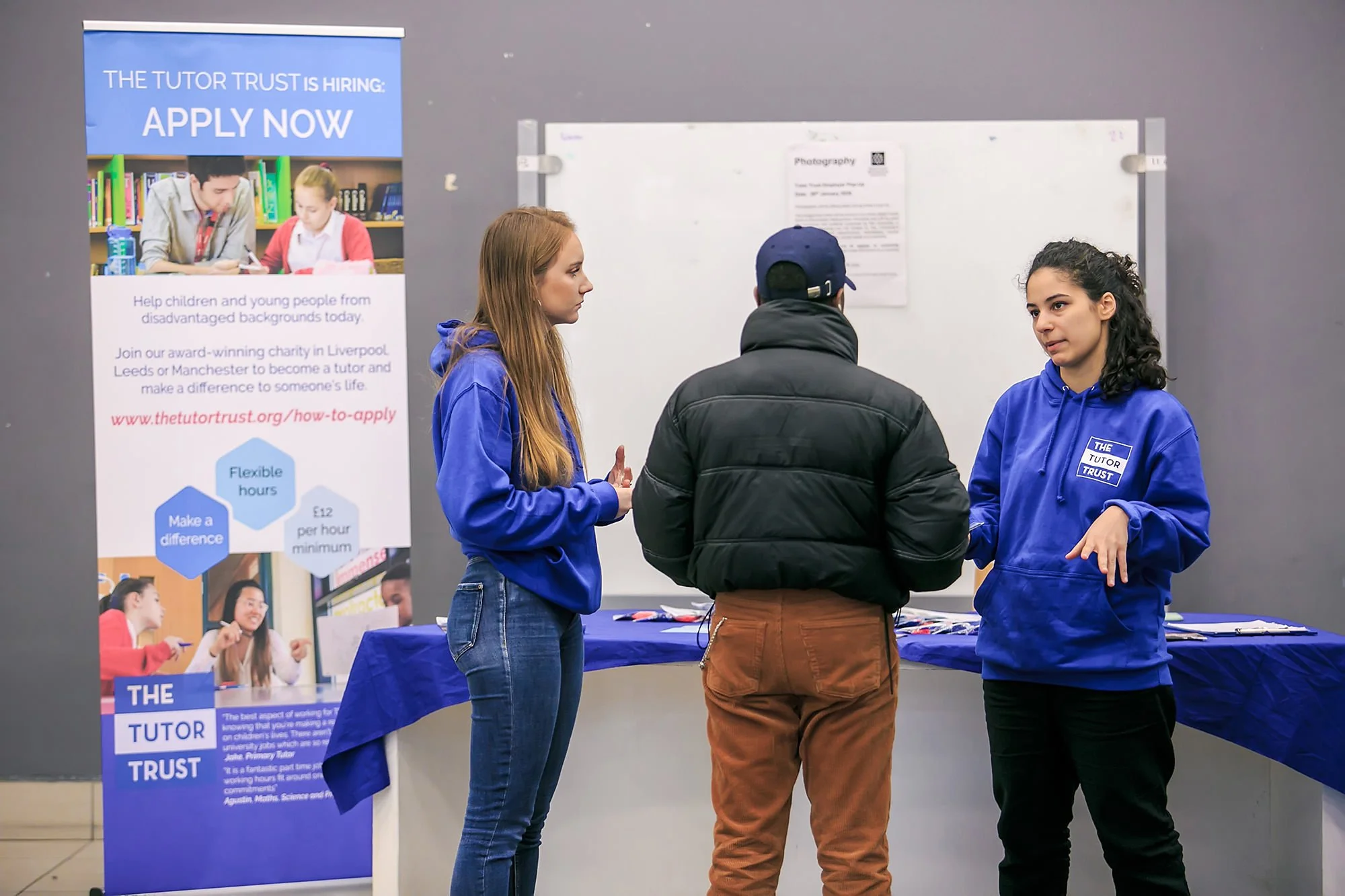 delegates converse at a tutor trust conference