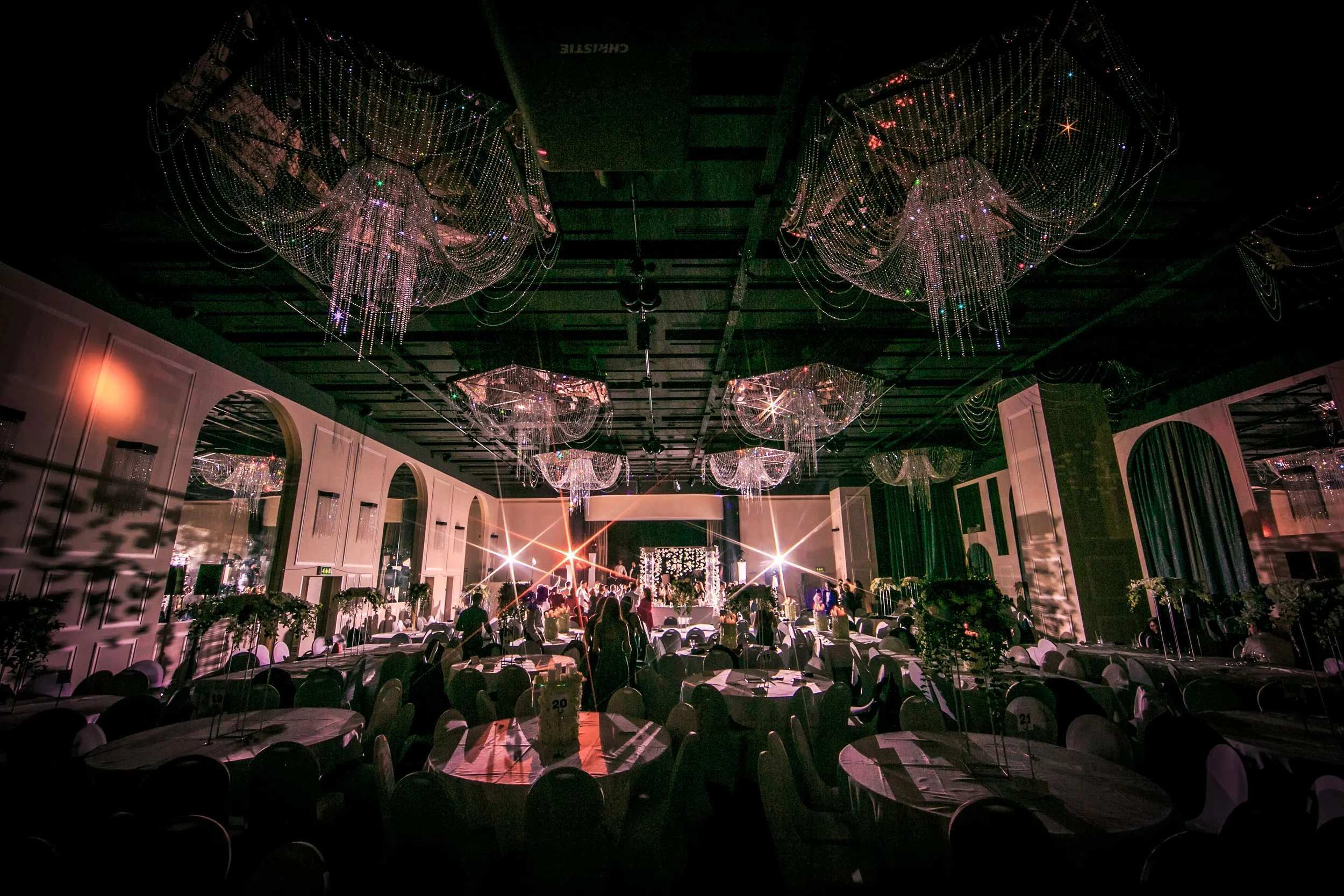atmospheric wide angle view of wedding reception party in international suite at mercure manchester piccadilly