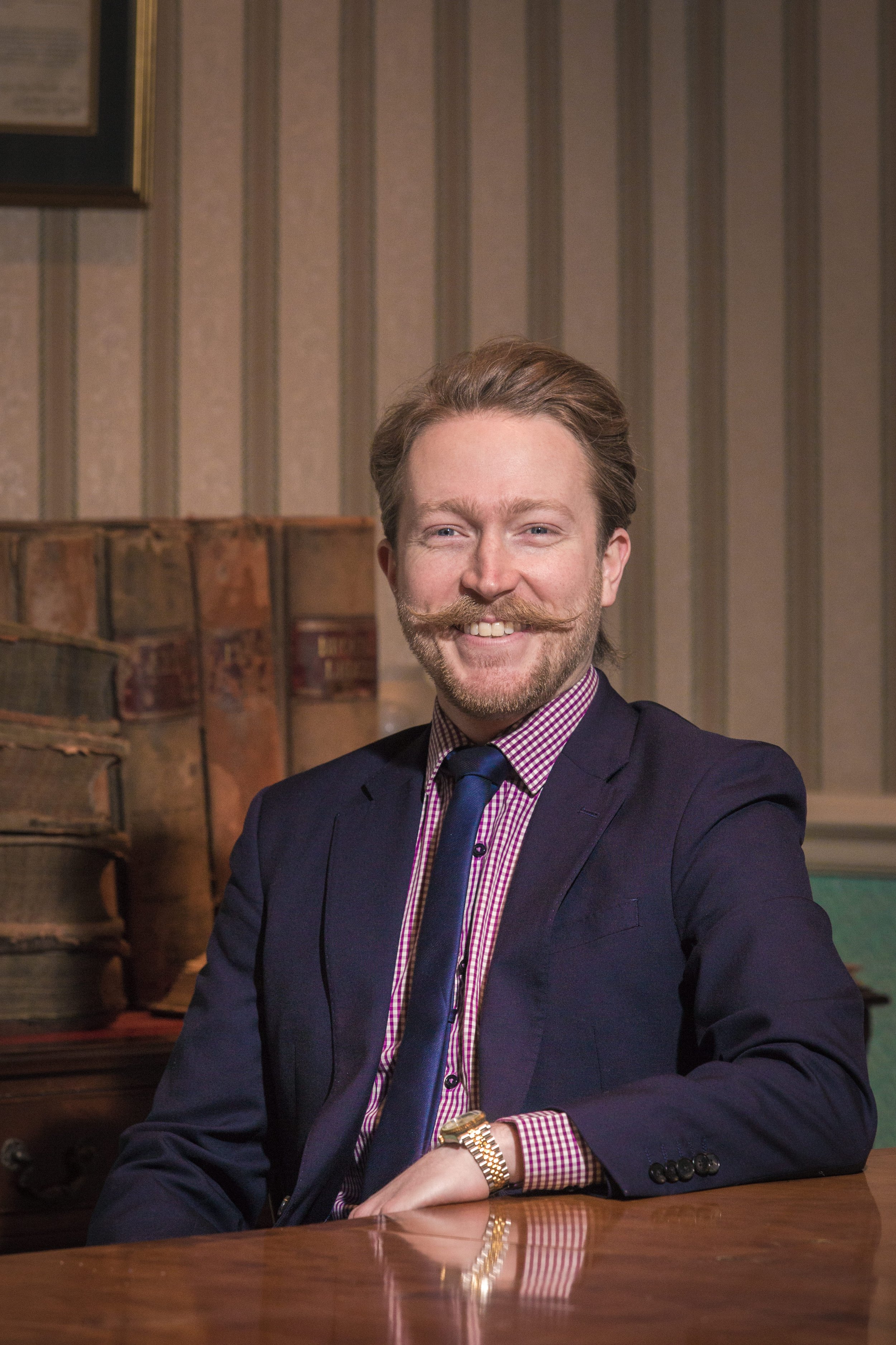 Professional executive headshot photographed for a business leader