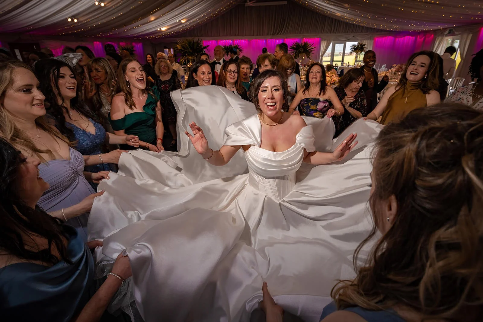 bride dancing during wedding reception at heaton house farm
