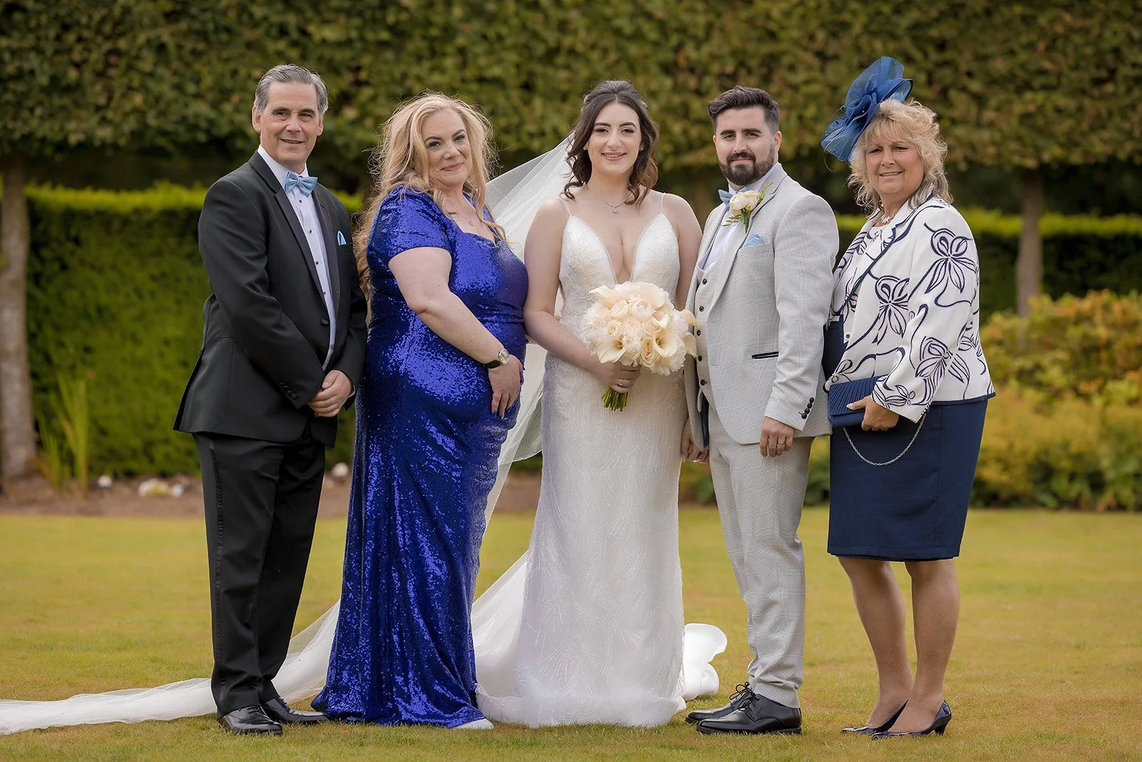 Merrydale Manor wedding group portrait formal attire outdoors – documentary wedding photography Manchester