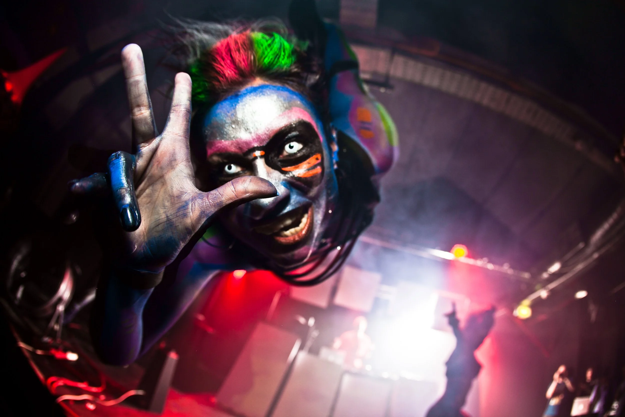 Entertainment hanging upside with face paint during private party in manchester