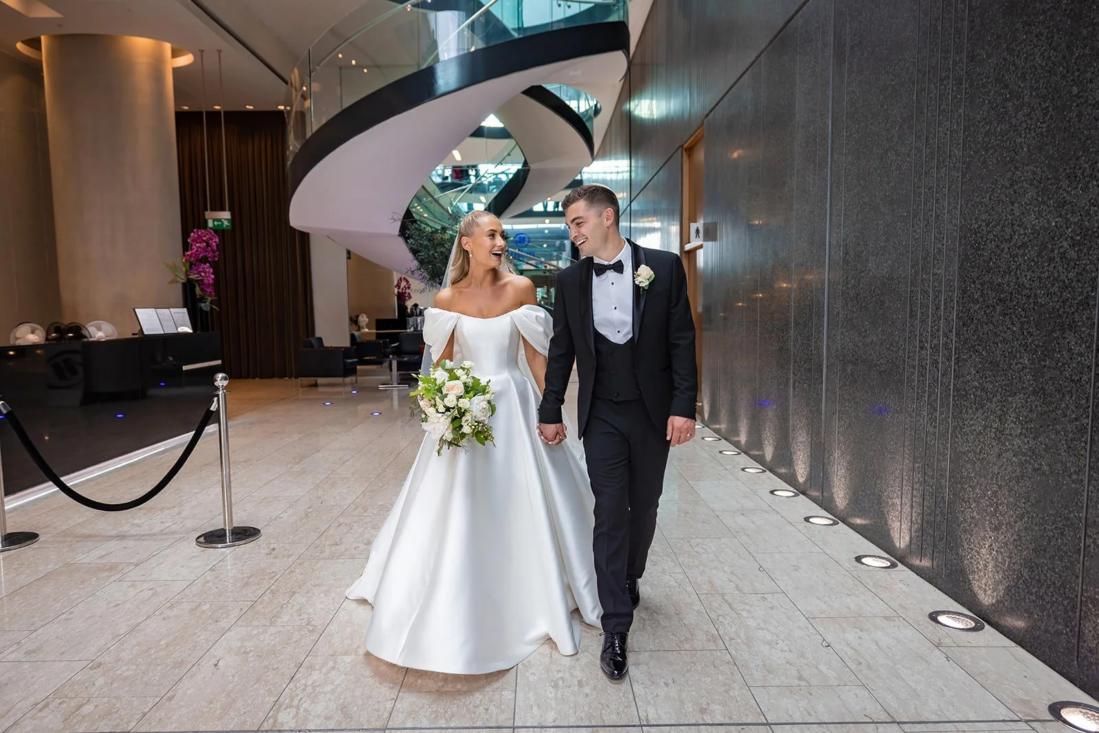 romantic newlywed bride and groom couple portrait in manchester deansgate hotel