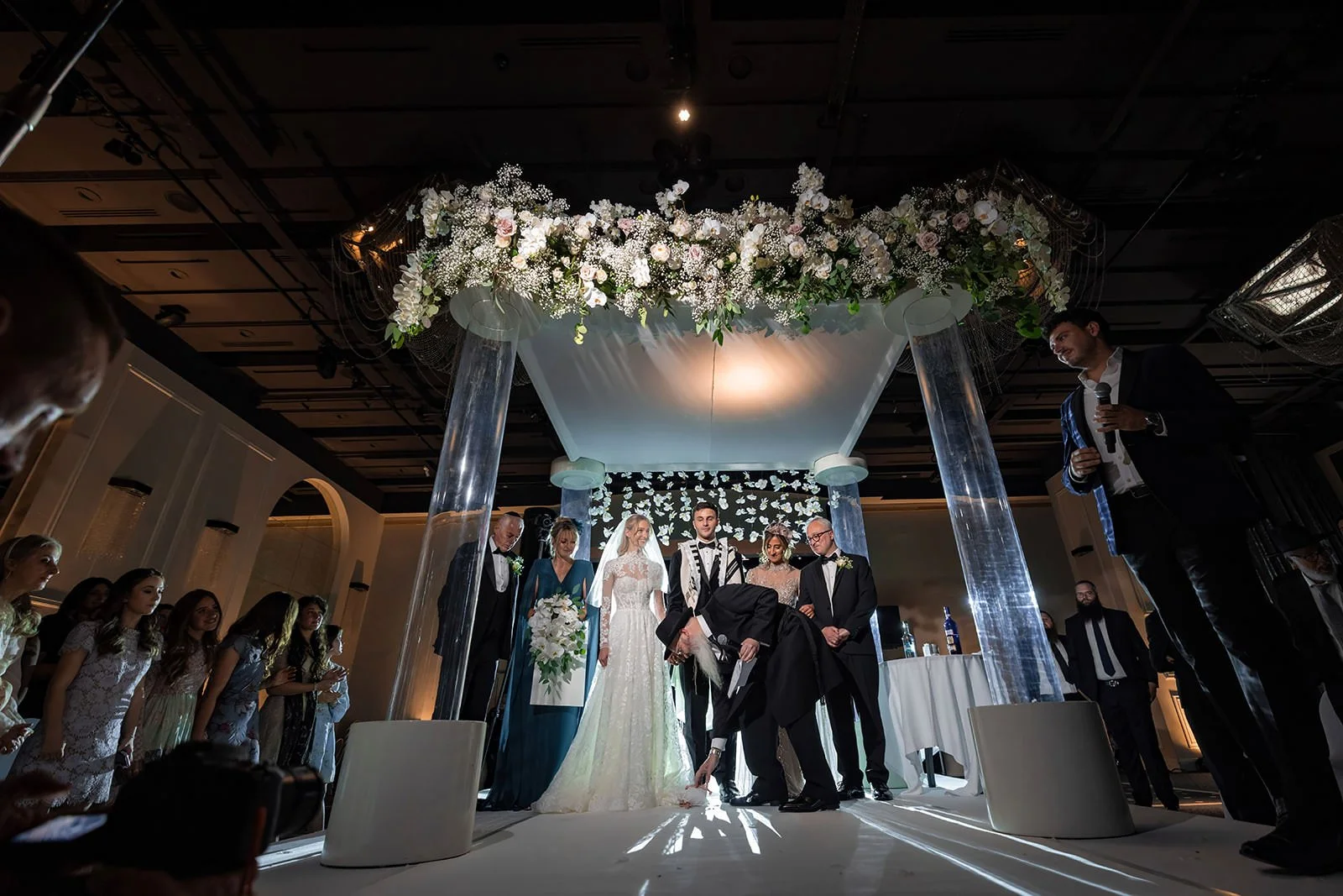 bride and groom exchange vows during wedding ceremony in international suite at mercure manchester piccadilly