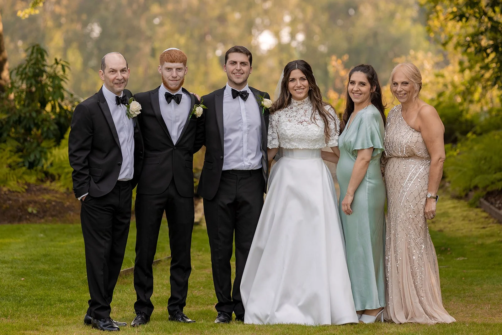 family portraits outdoors at nunsmere hall wedding venue in cheshire