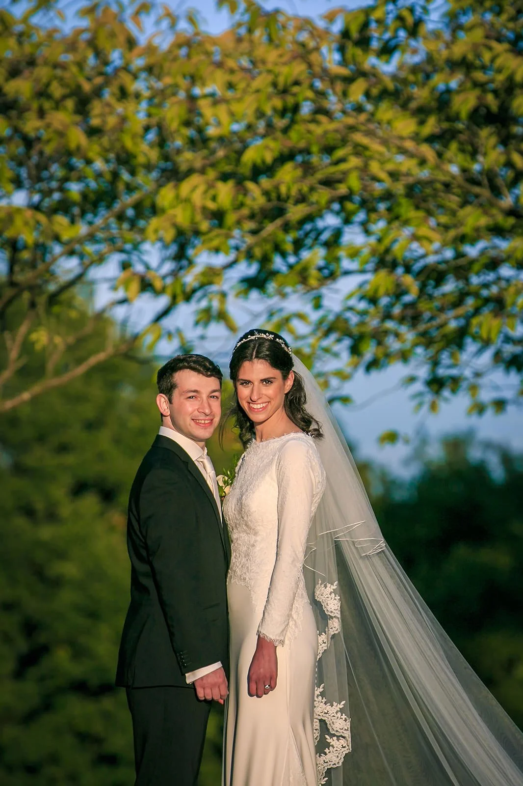 Bride and groom portrait in garden grounds at Fairmont Cheshire - The Mere, Knutsford
