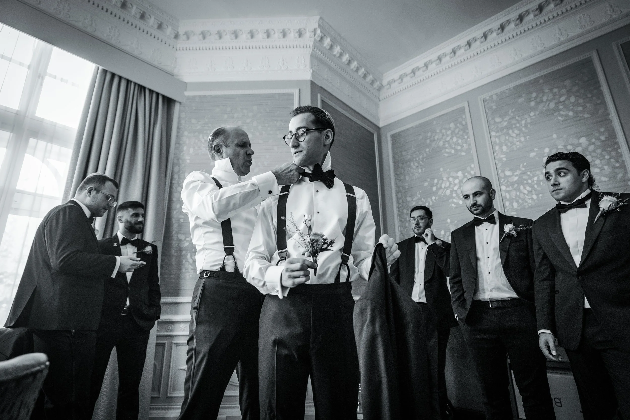 groom and groomsmen getting ready during prep at midland hotel manchester