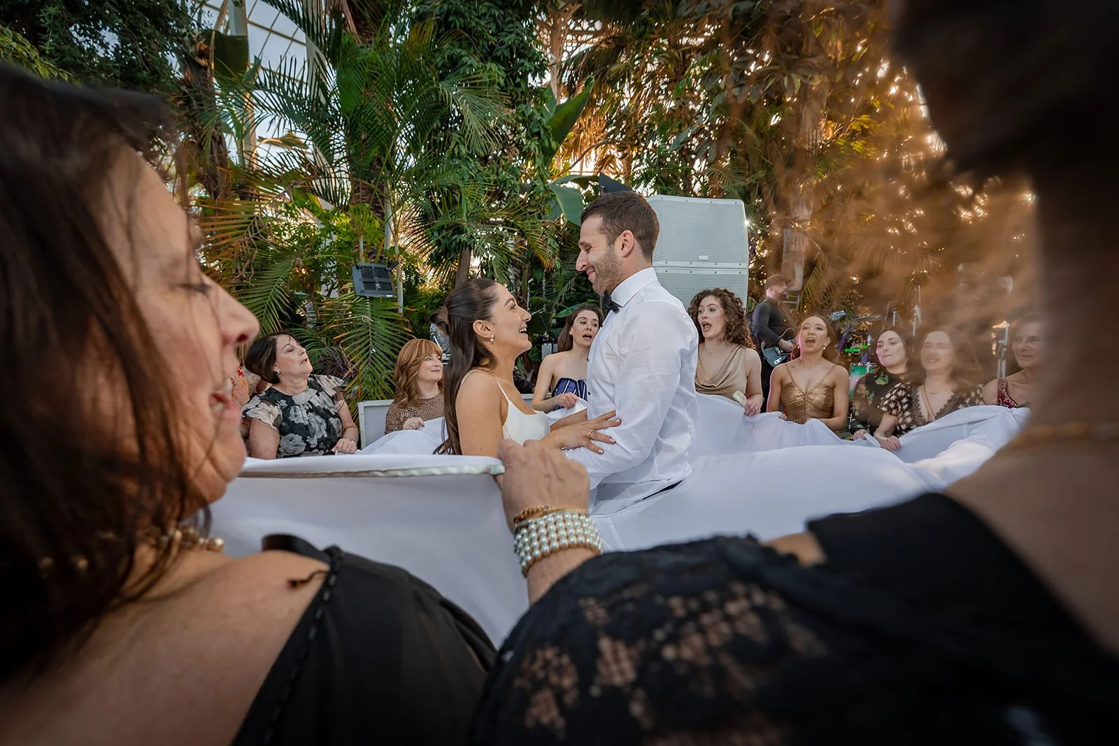 bride and groom dancing at wedding reception at sefton park palm house in liverpool