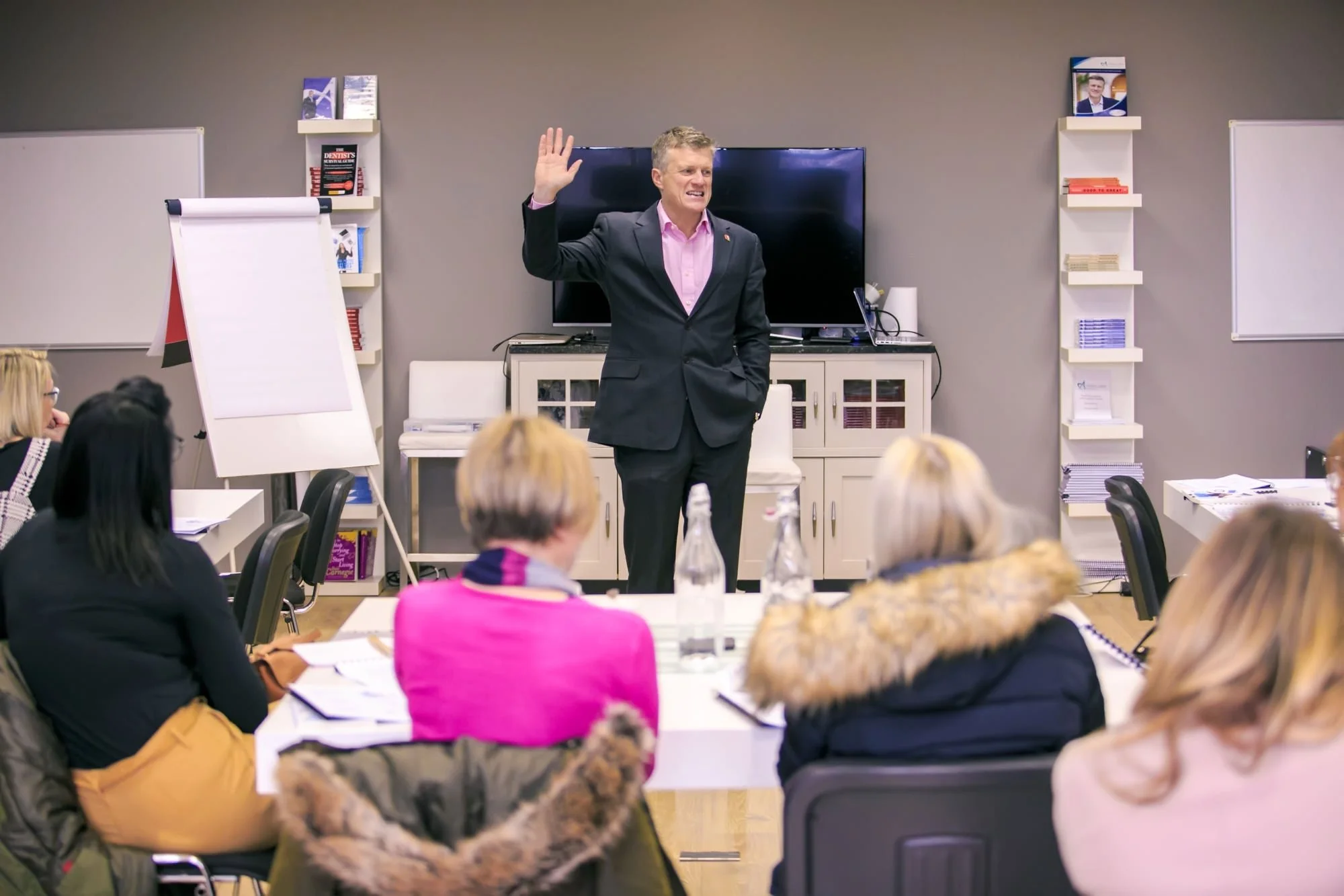 Professional speaker leading a corporate training event