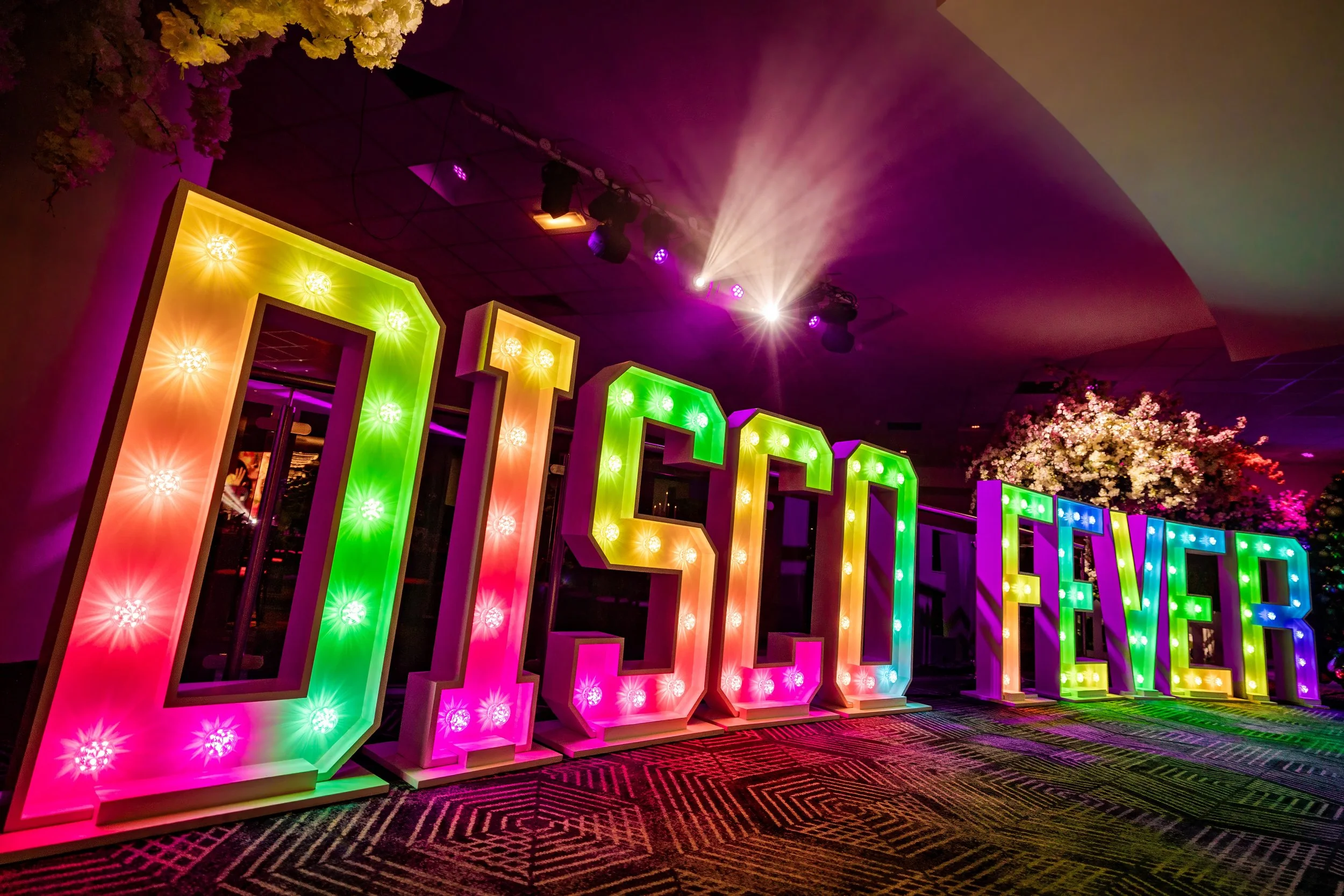 Custom event branding display at a corporate celebration