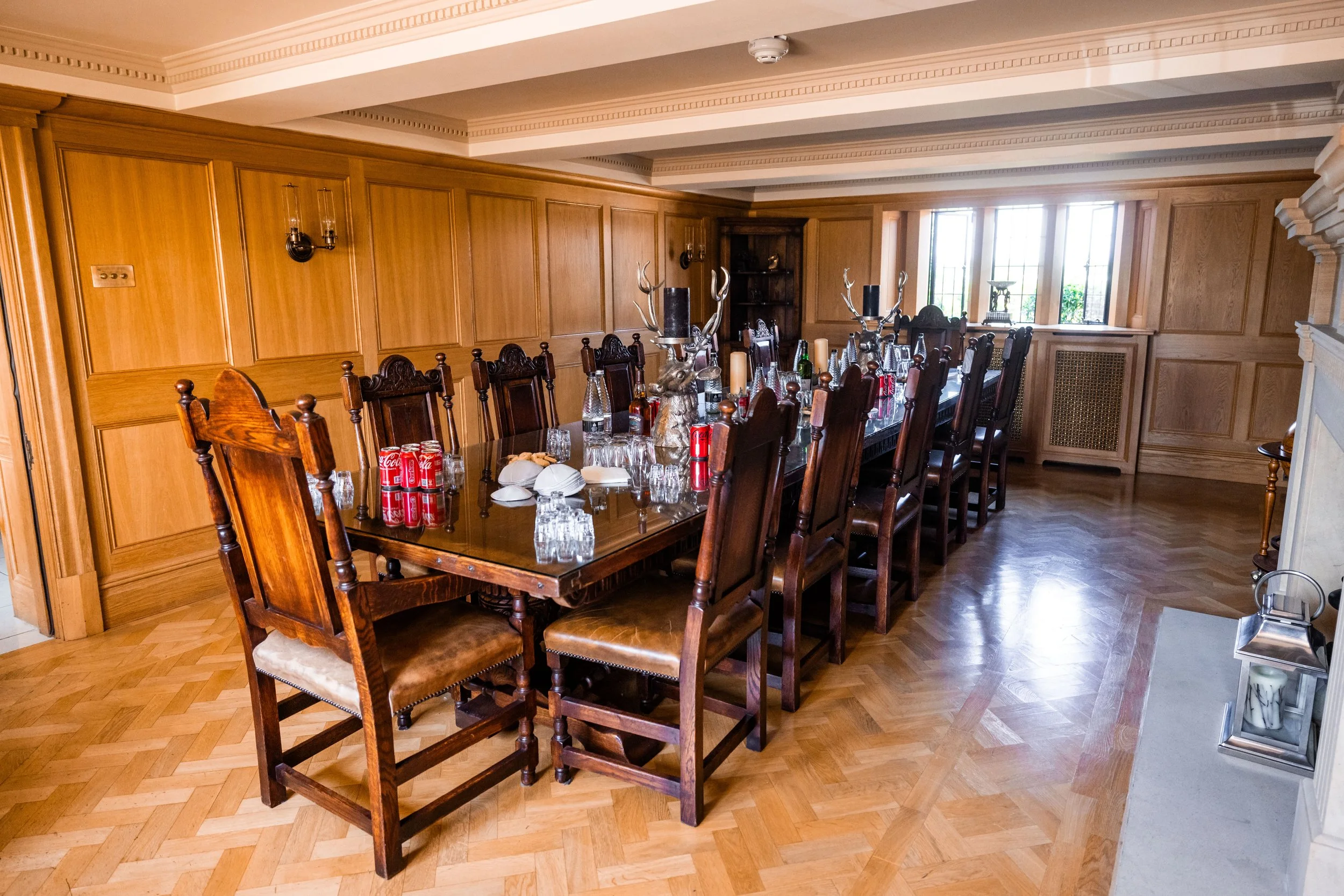 Merrydale Manor wedding dining table set with candles and chairs – documentary wedding photographer Manchester