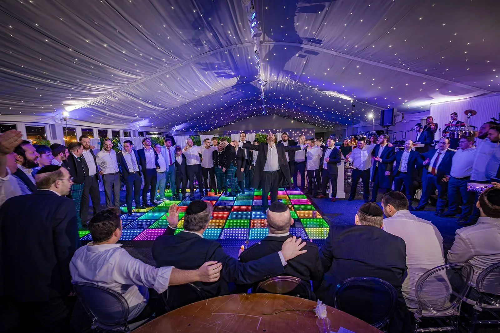 Traditional circle dancing in Nunsmere Hall marquee, LED dance floor
