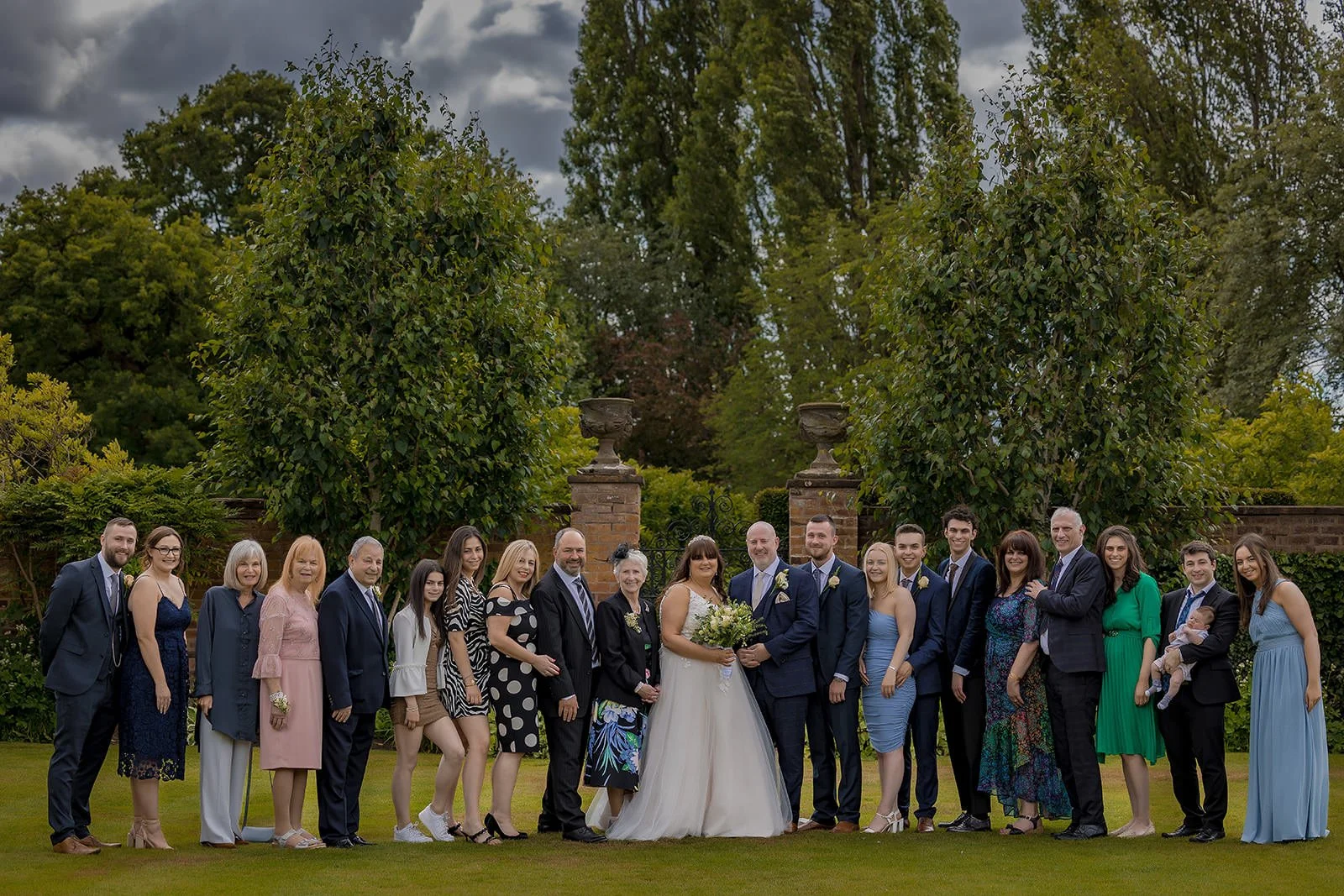 family portraits in the garden at colshaw hall wedding venue in cheshire