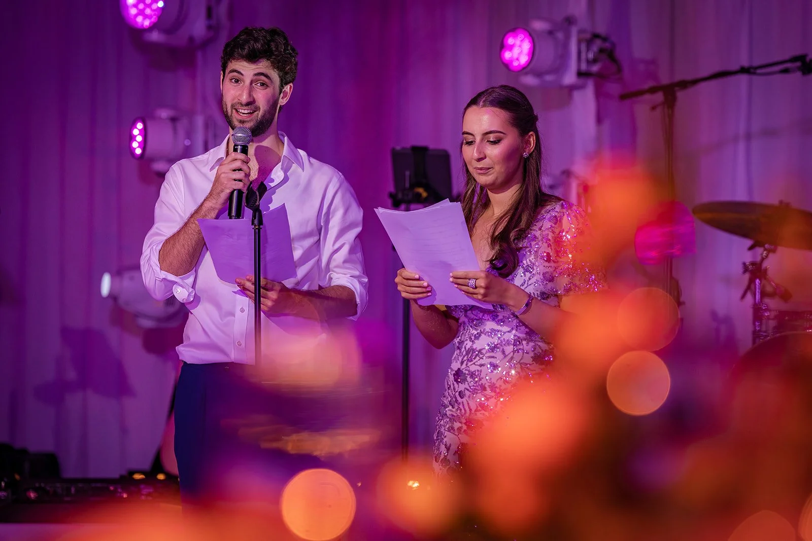 Bride and groom giving speech together at Nunsmere Hall wedding reception
