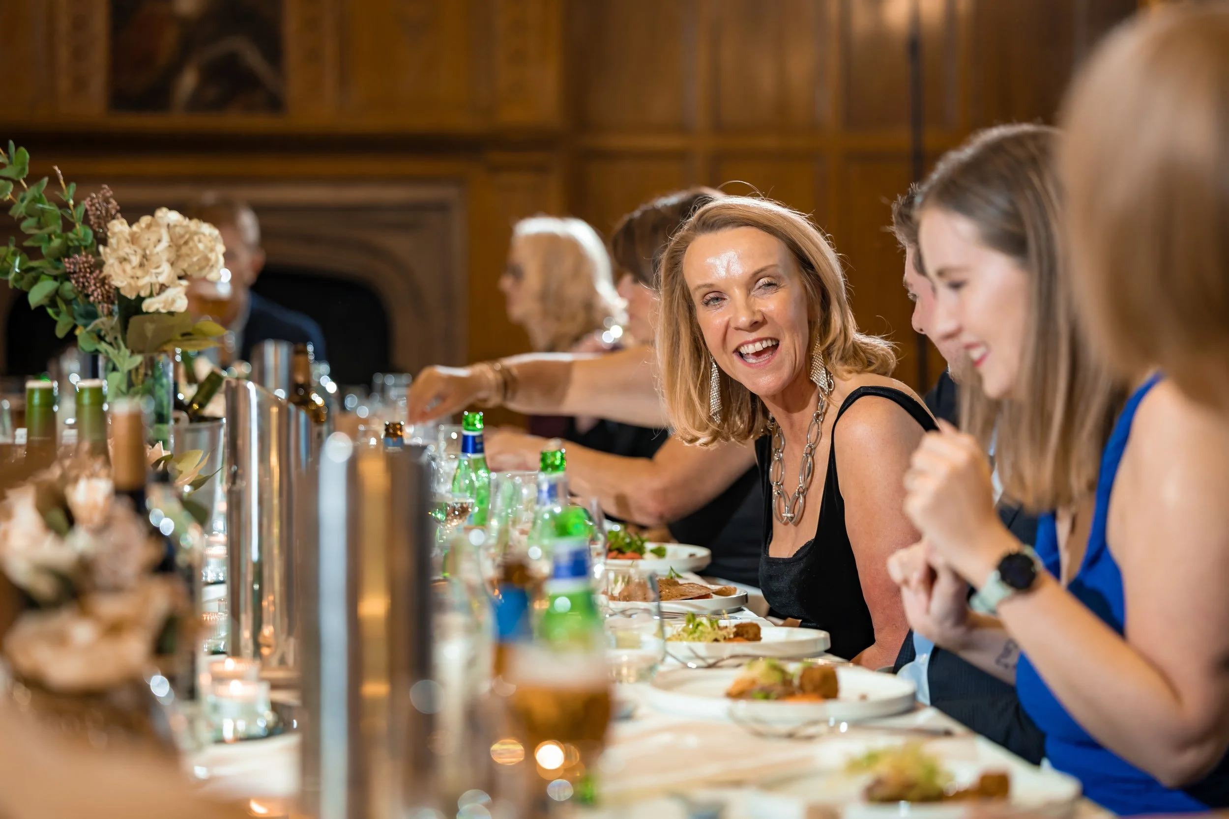 Guests enjoying dinner together during a 60th birthday celebration at The Midland Hotel, Manchester