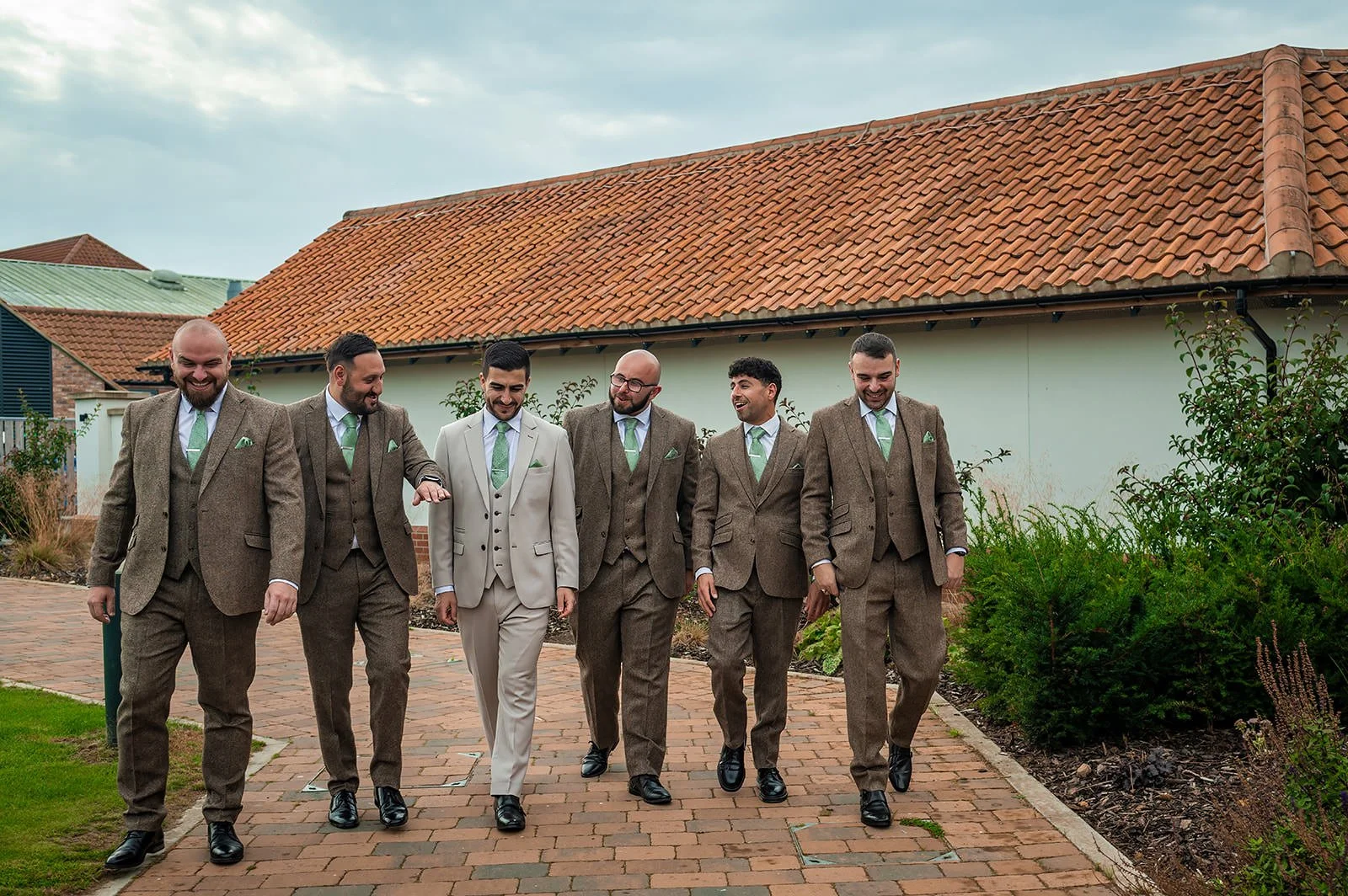 groom and groomsmen arrive at white syke fields wedding venue in yorkshire
