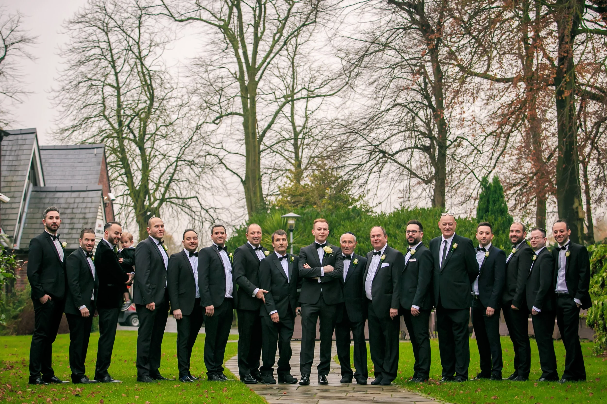 outdoor groomsmen portrait at worsley marriott hotel