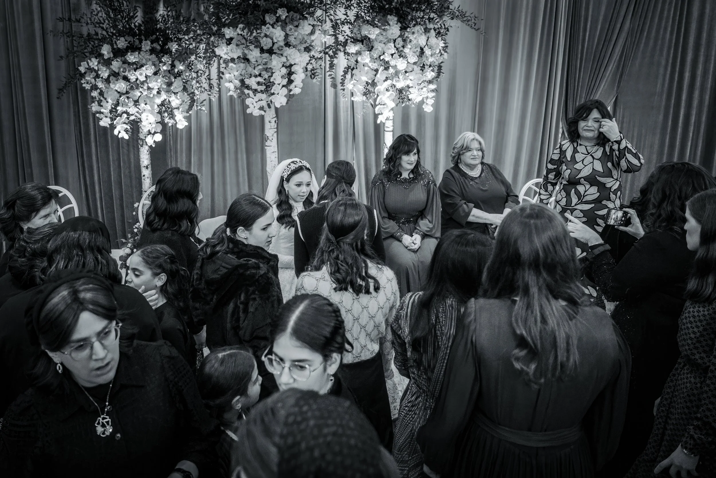 kallah bride and guests during bedeken at charedi jewish wedding