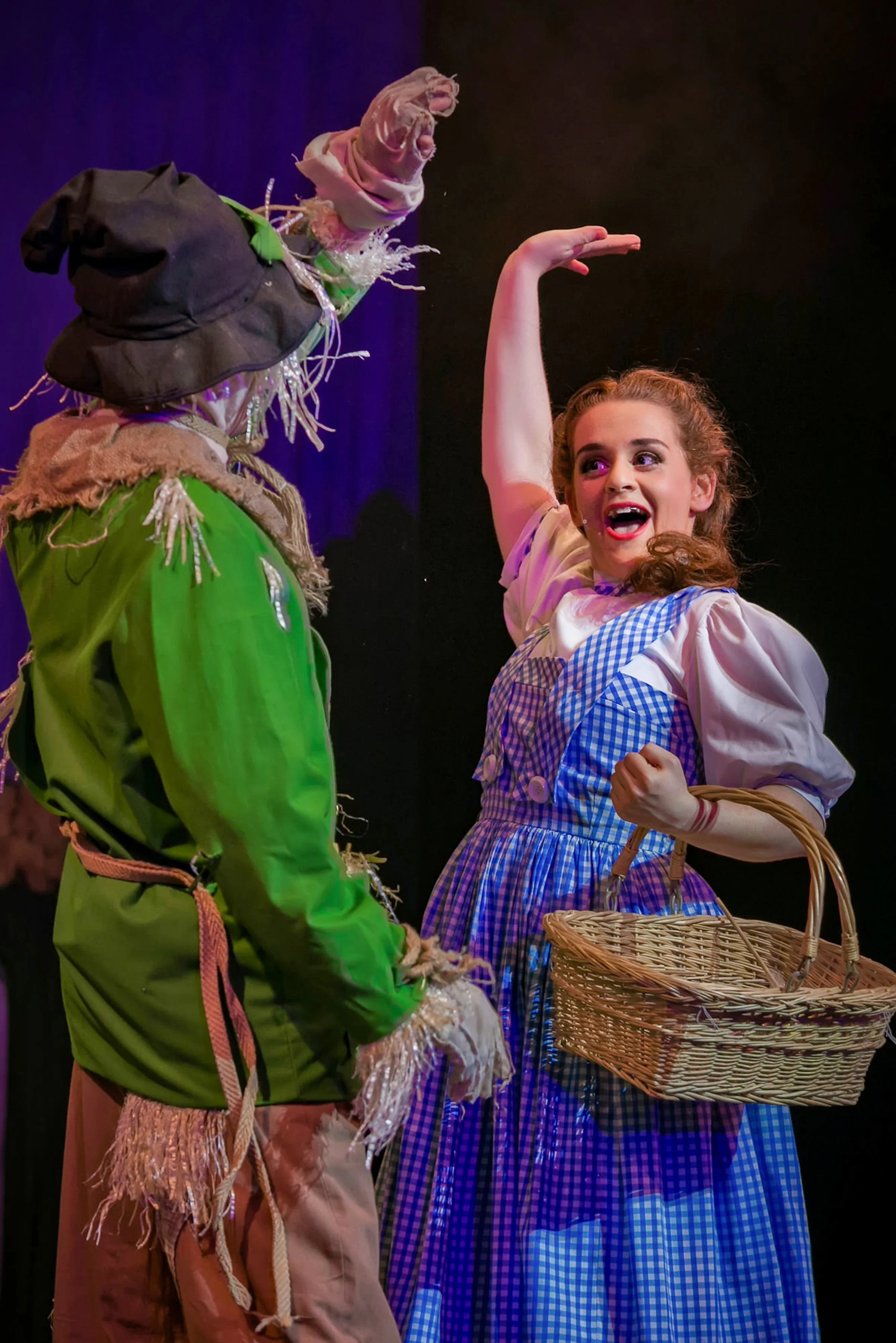dorothy and scarecrow in wizard of oz production on stage theatre performance dramatic photography portrait with make-up and costume