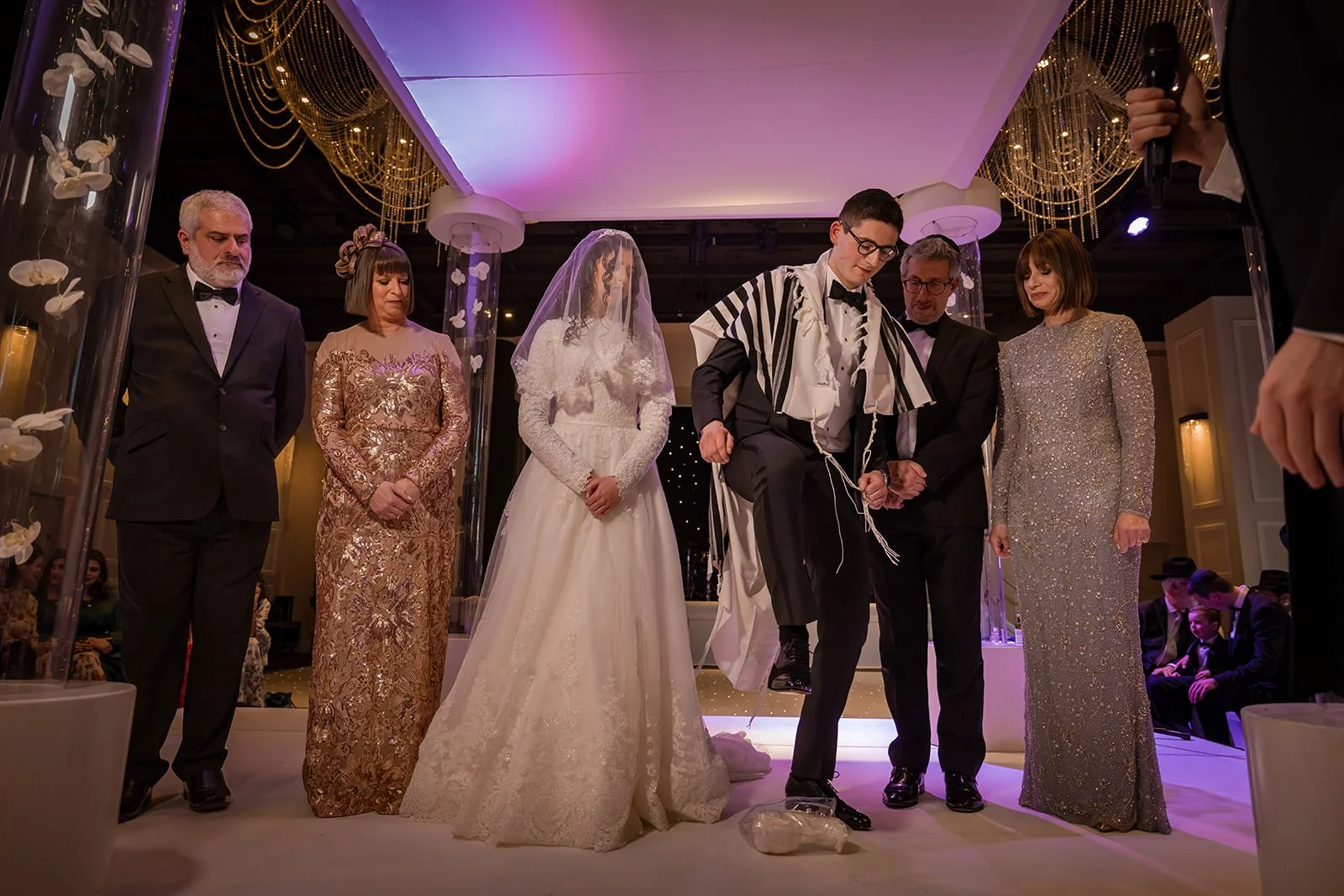 bride and groom exchange vows during wedding ceremony in international suite at mercure manchester piccadilly
