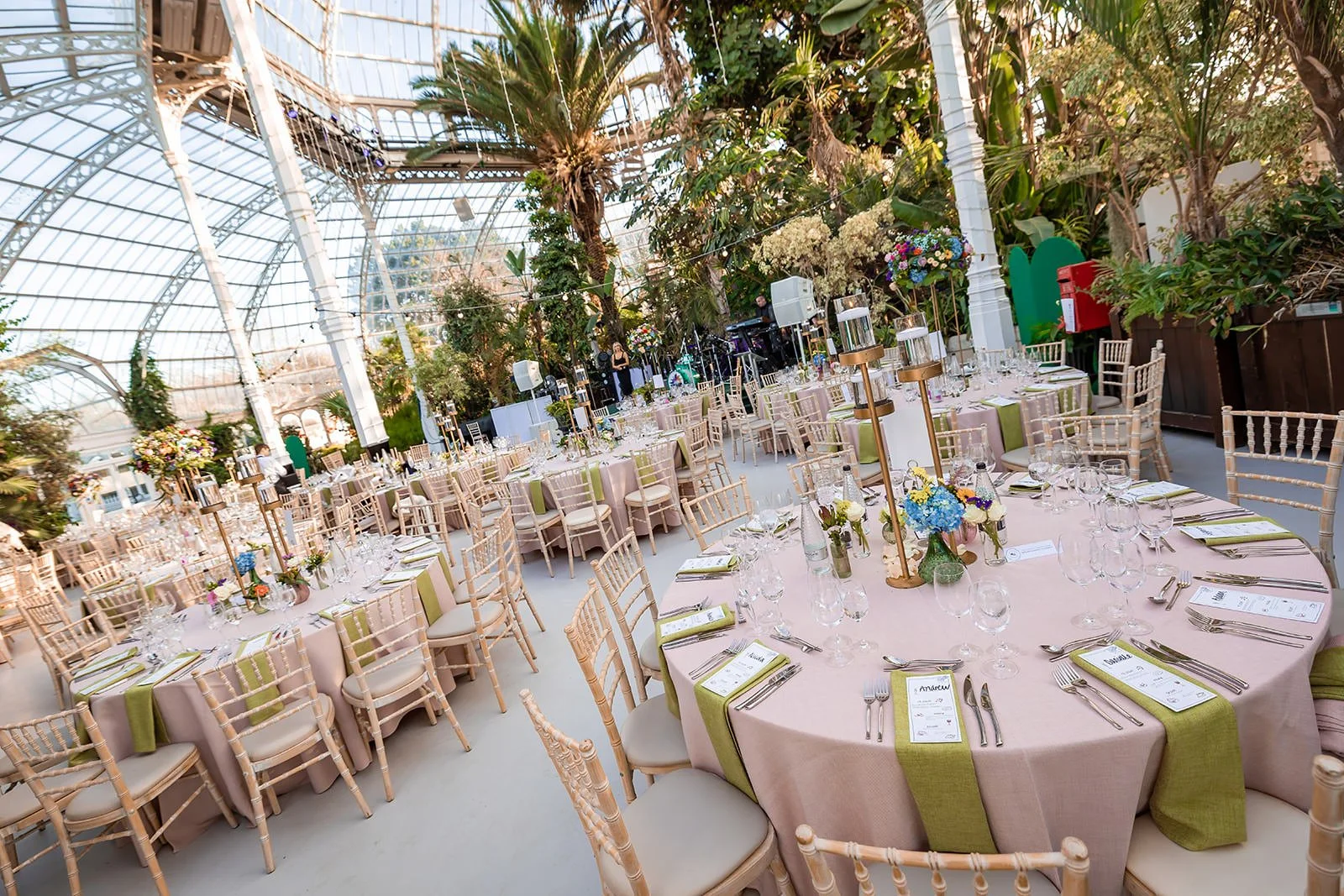 sefton park palm house wedding venue interior set up with tables and decor for reception dinner and dancing