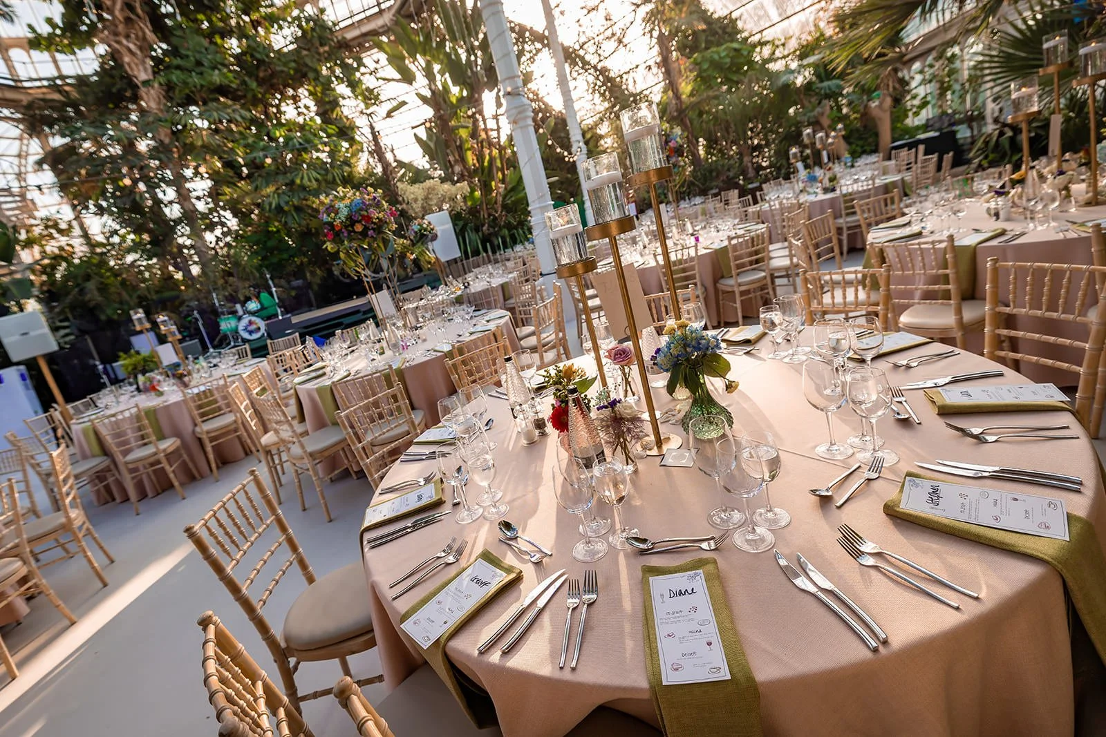 sefton park palm house wedding venue interior set up with tables and decor for reception dinner and dancing