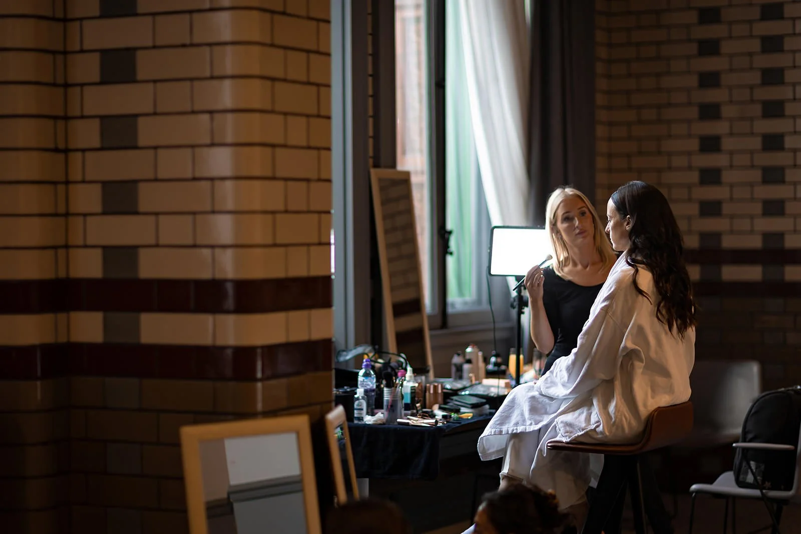bride getting ready during bridal prep at kimpton clocktower manchester