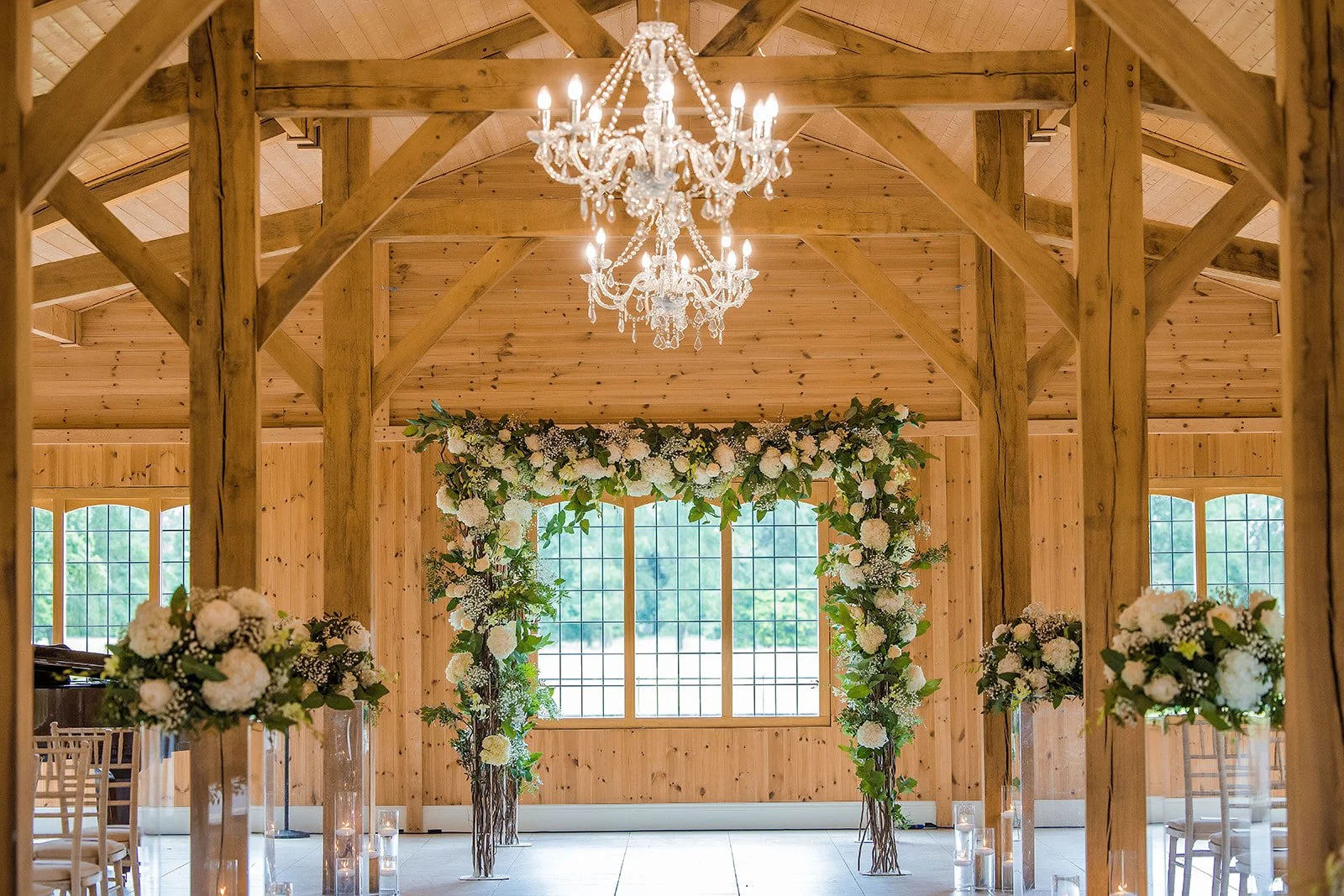 Merrydale Manor wedding chapel white flowers greenery and chandelier – Manchester wedding photographer