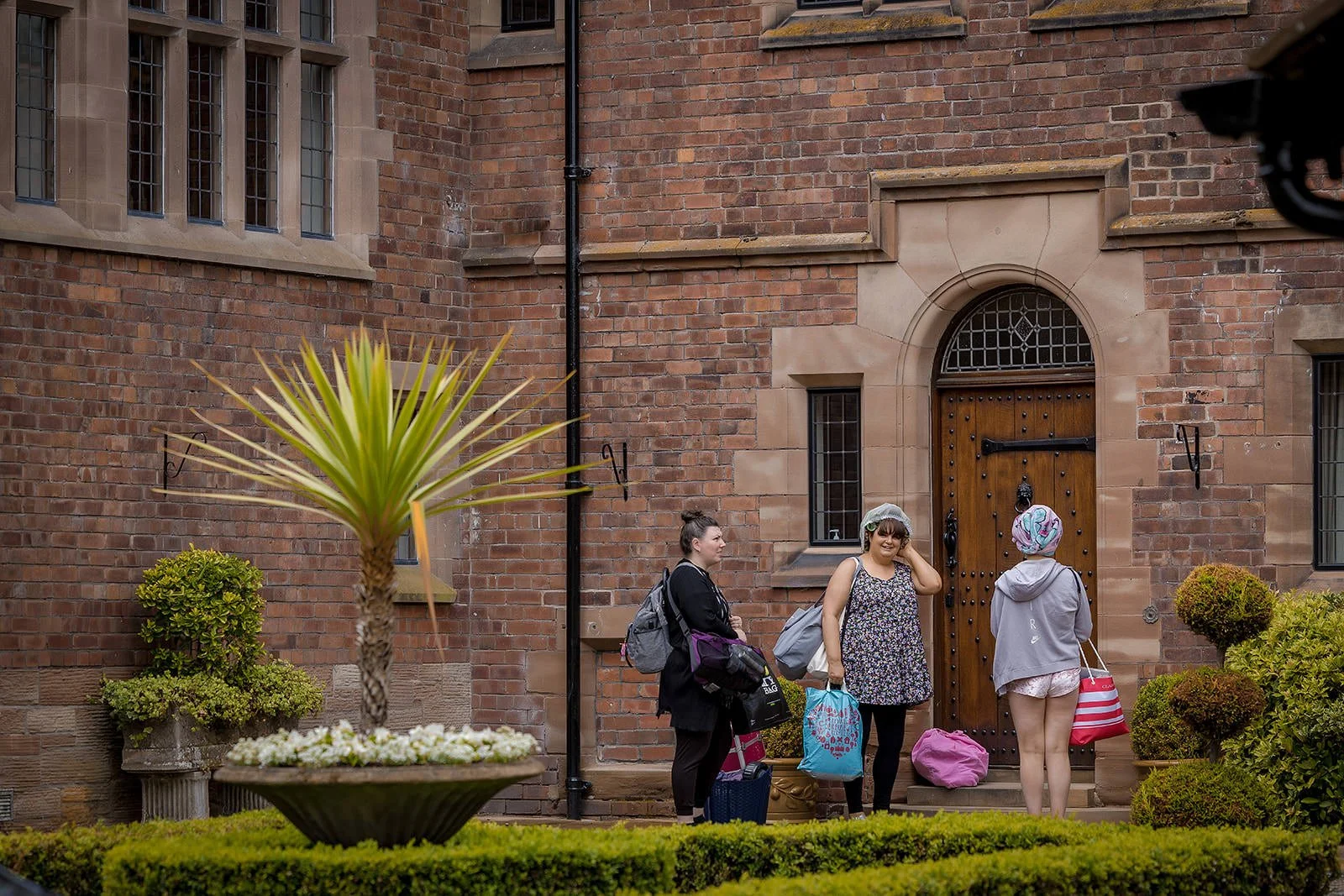 bride arrival at colshaw hall wedding venue in cheshire for prep
