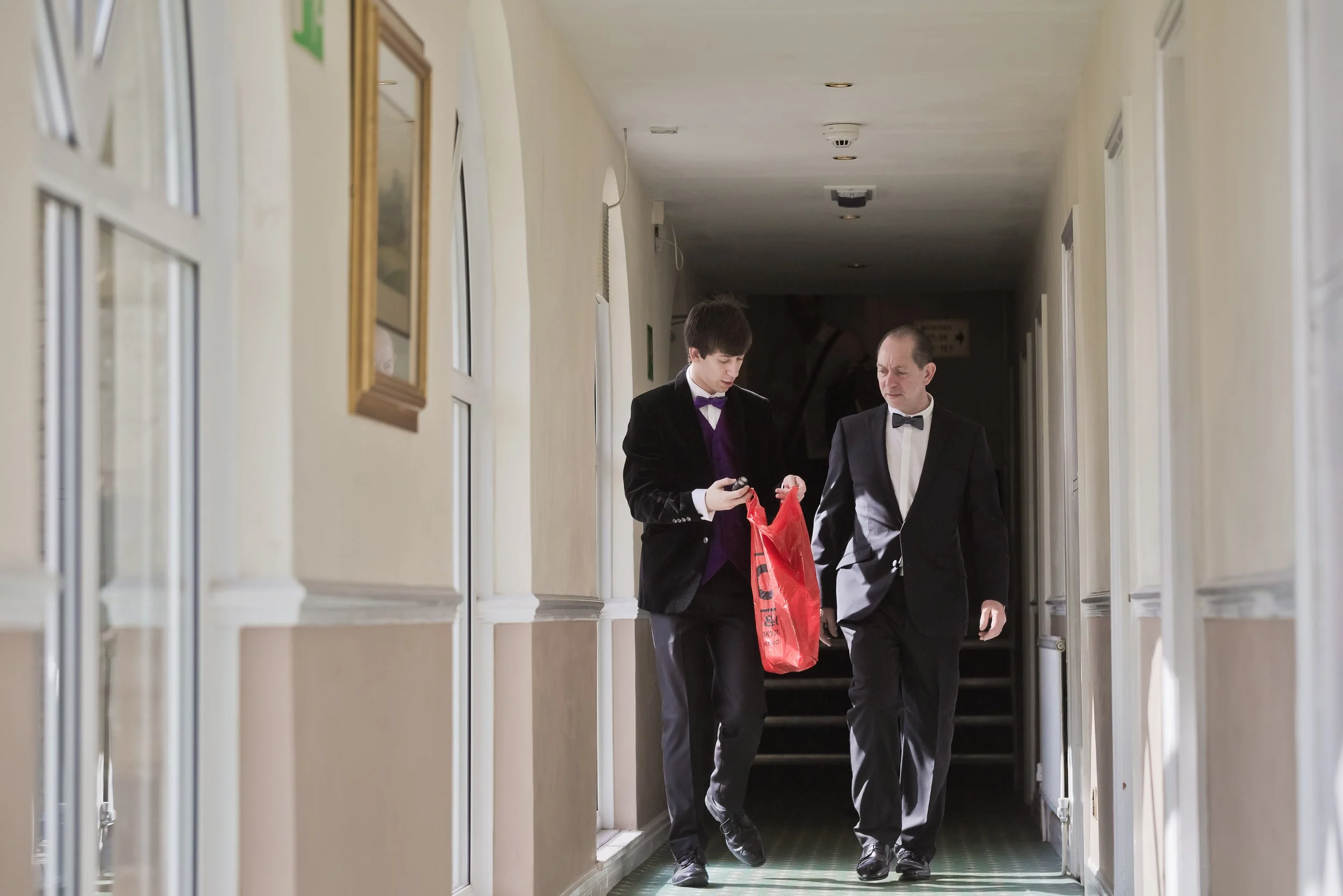 groom and dad at last drop wedding venue in bolton