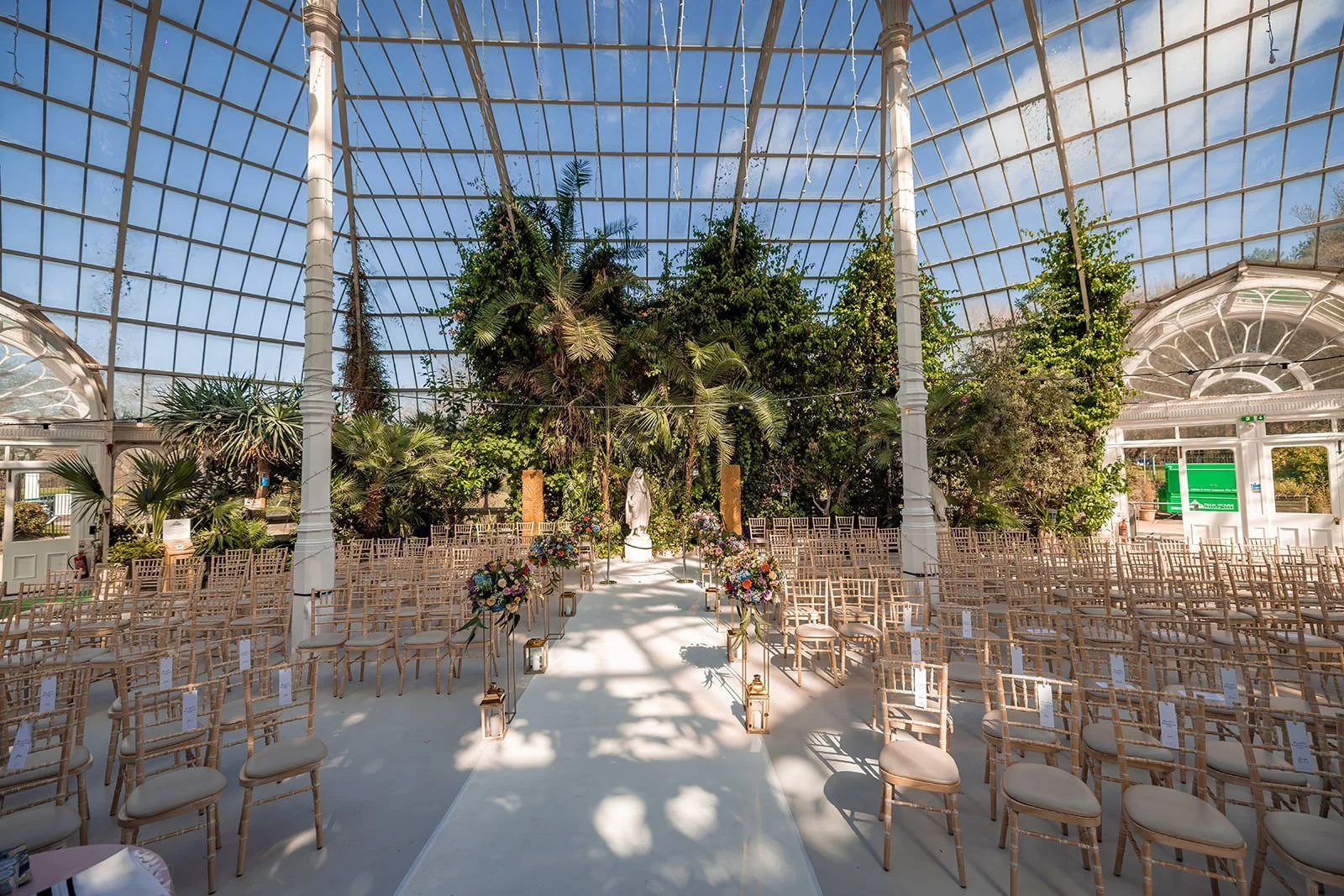 wedding ceremony set up inside sefton park palm house in liverpool