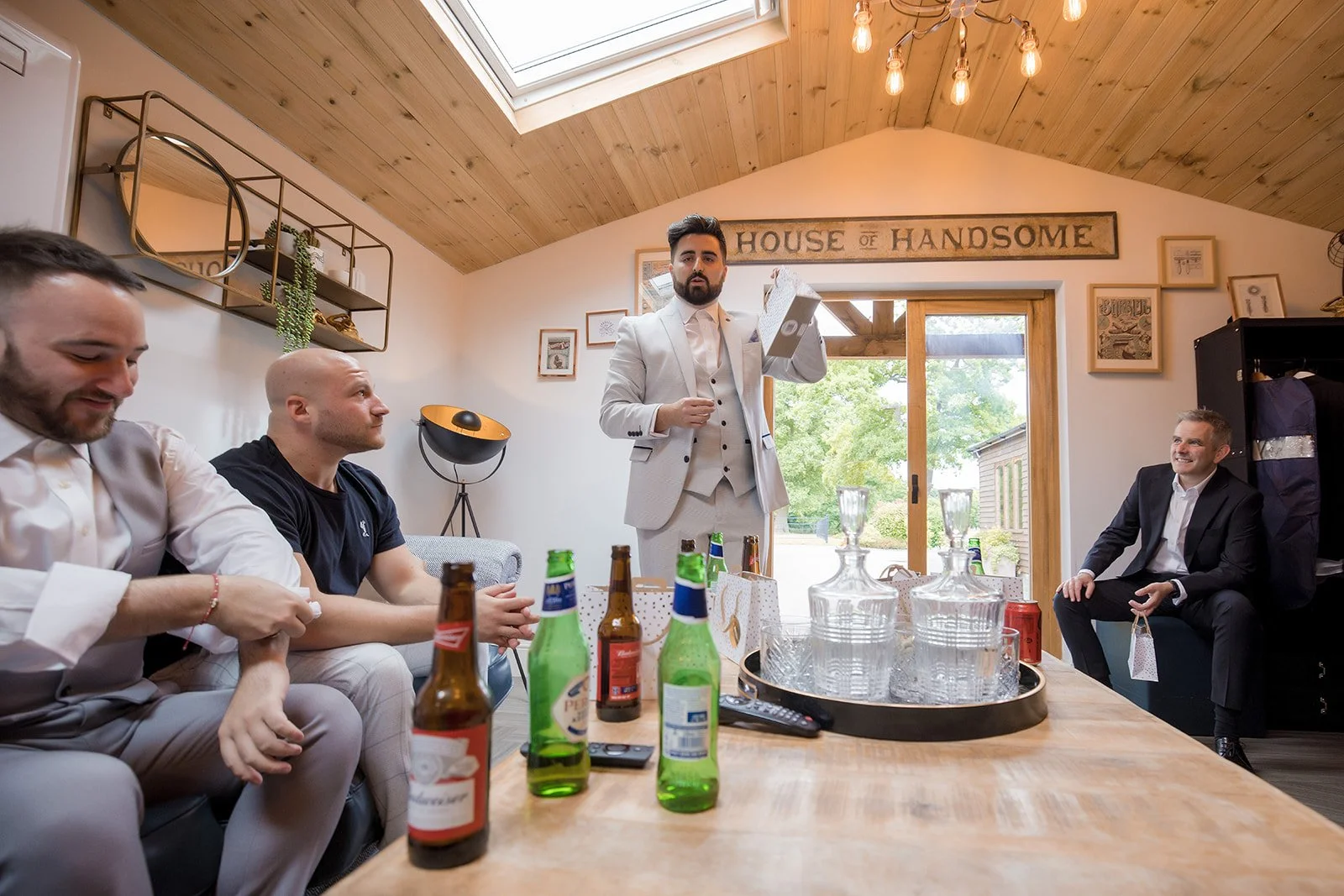 Merrydale Manor wedding groomsmen toasting before ceremony – documentary wedding photography Manchester