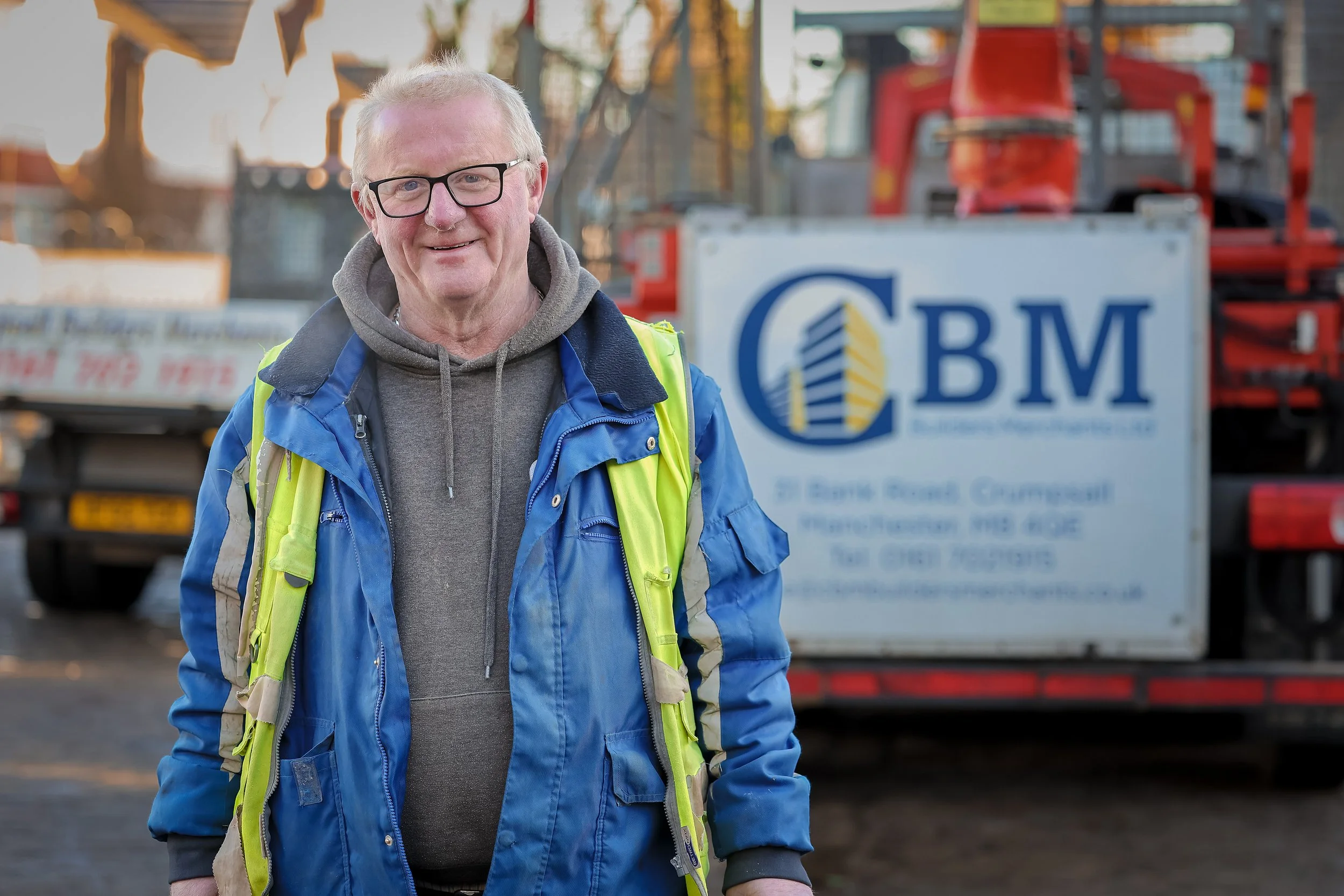 Workplace portrait of an employee photographed at a company premises