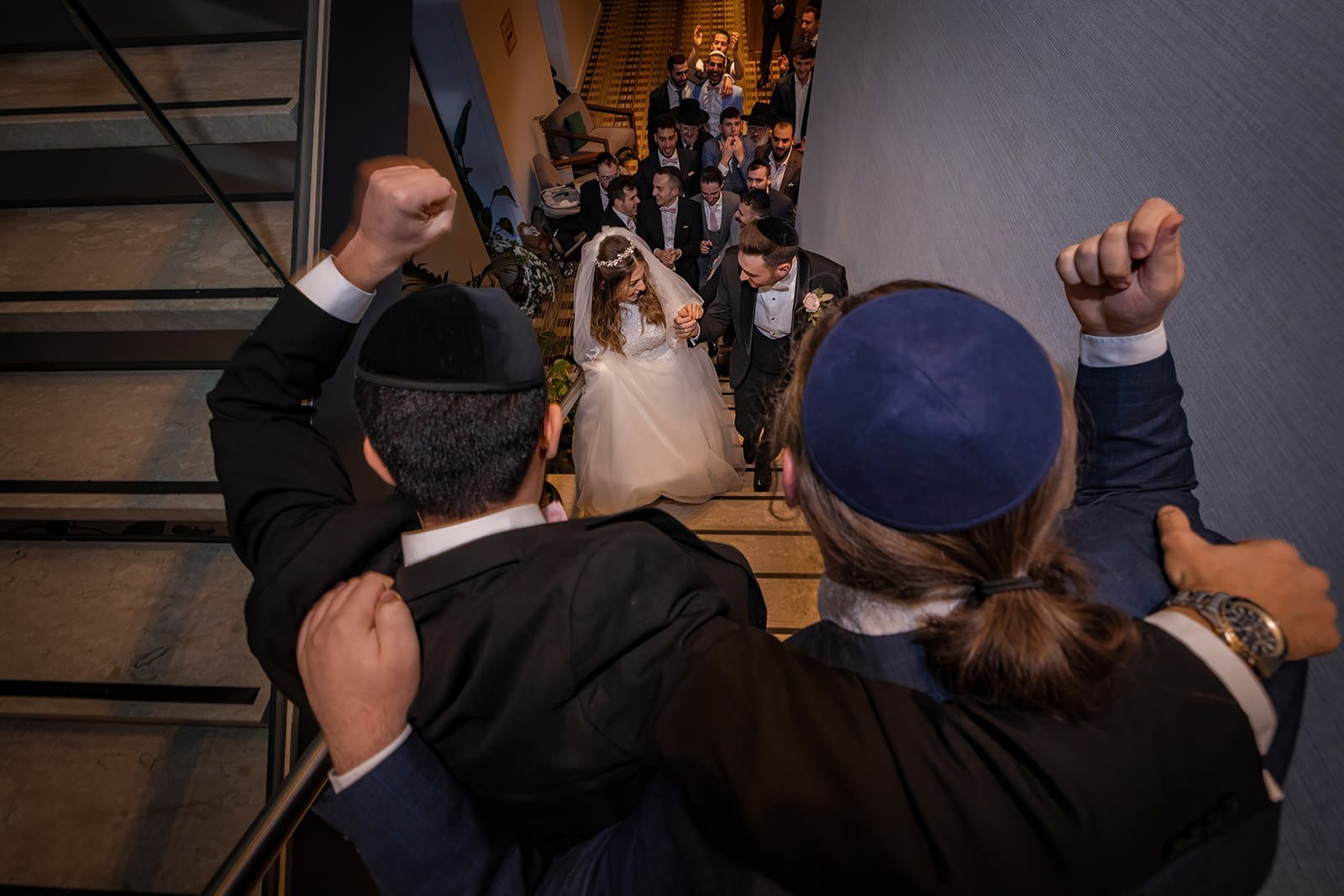 bride and groom leave wedding ceremony at manchester deansgate hotel
