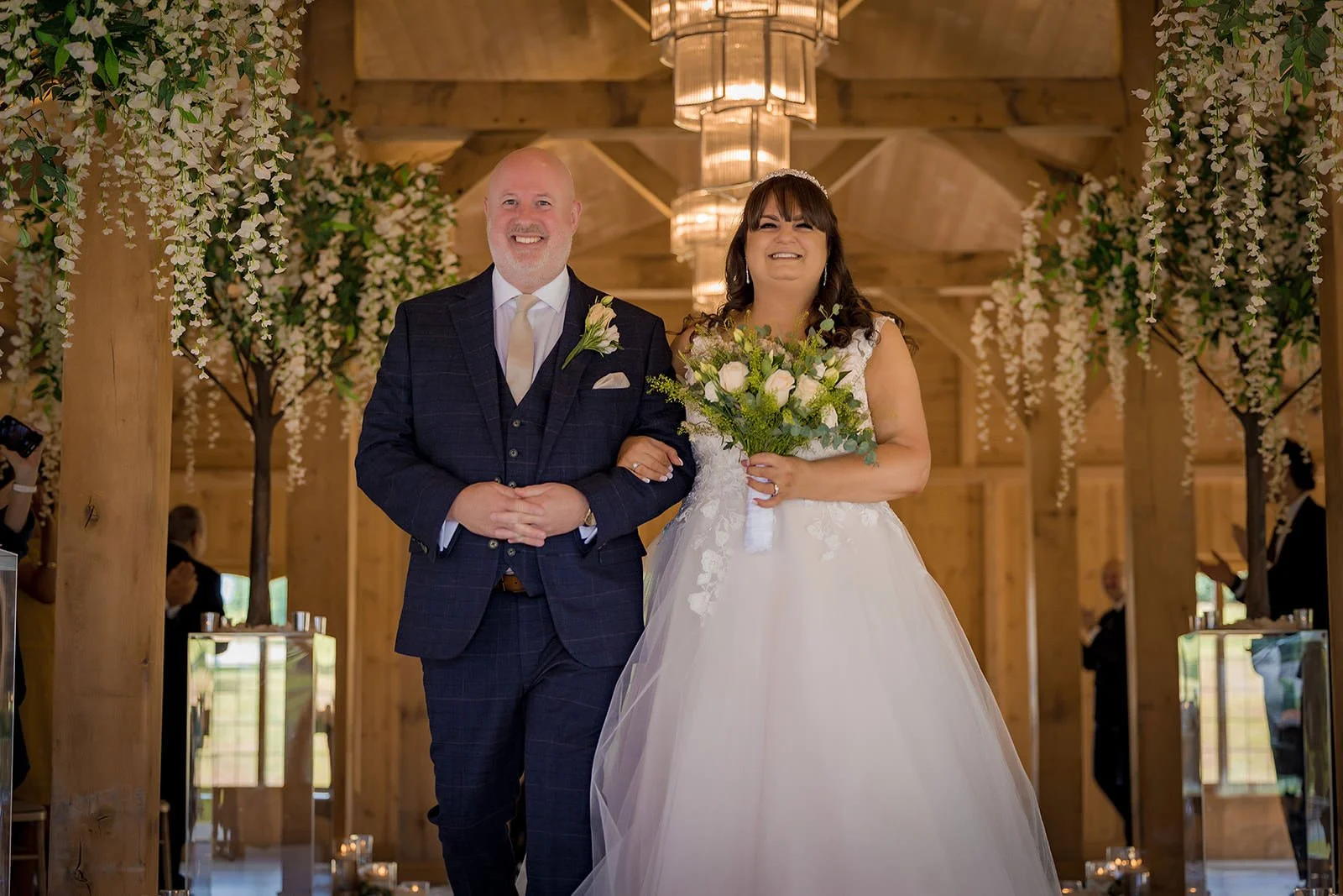 bride and groom leaving ceremony at colshaw hall in cheshire