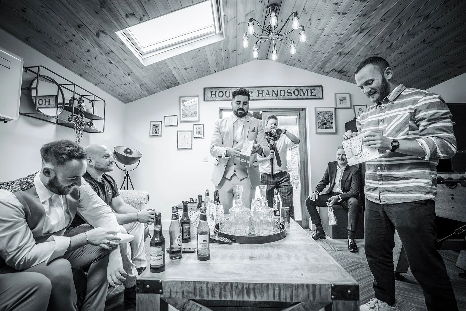Merrydale Manor wedding groomsmen getting ready in living room – wedding photographer North West England