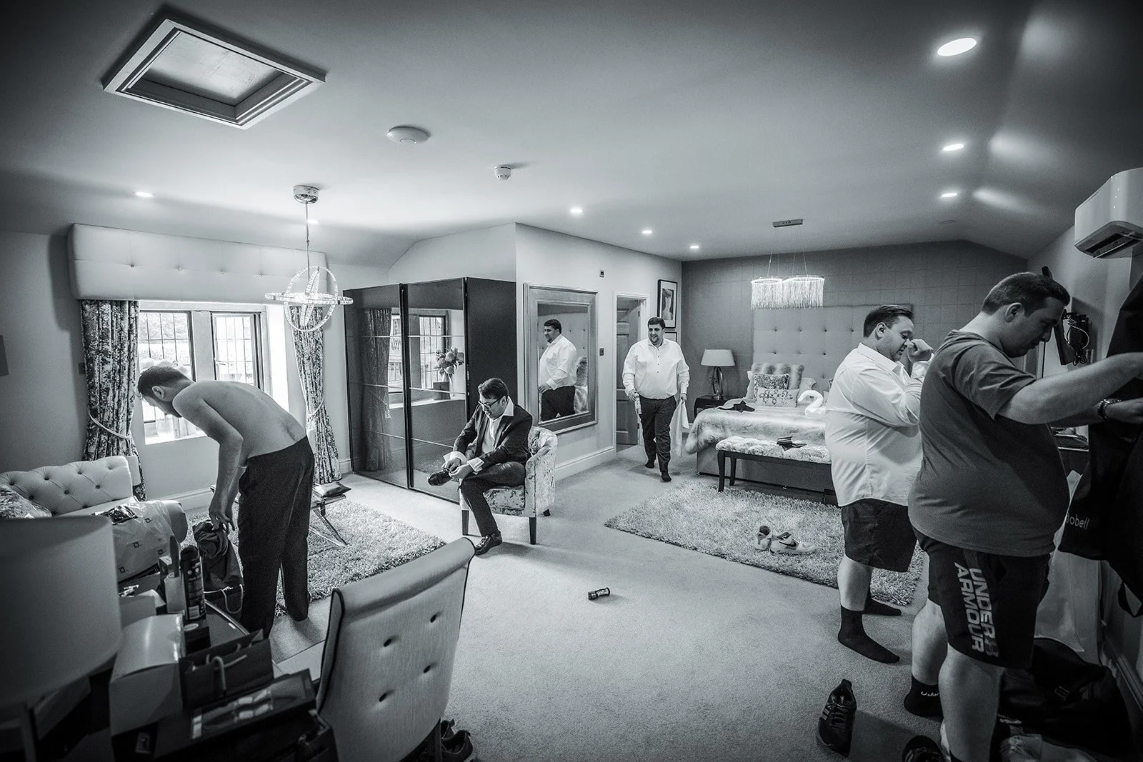 Merrydale Manor wedding groomsmen getting ready in hotel room – documentary wedding photographer Manchester