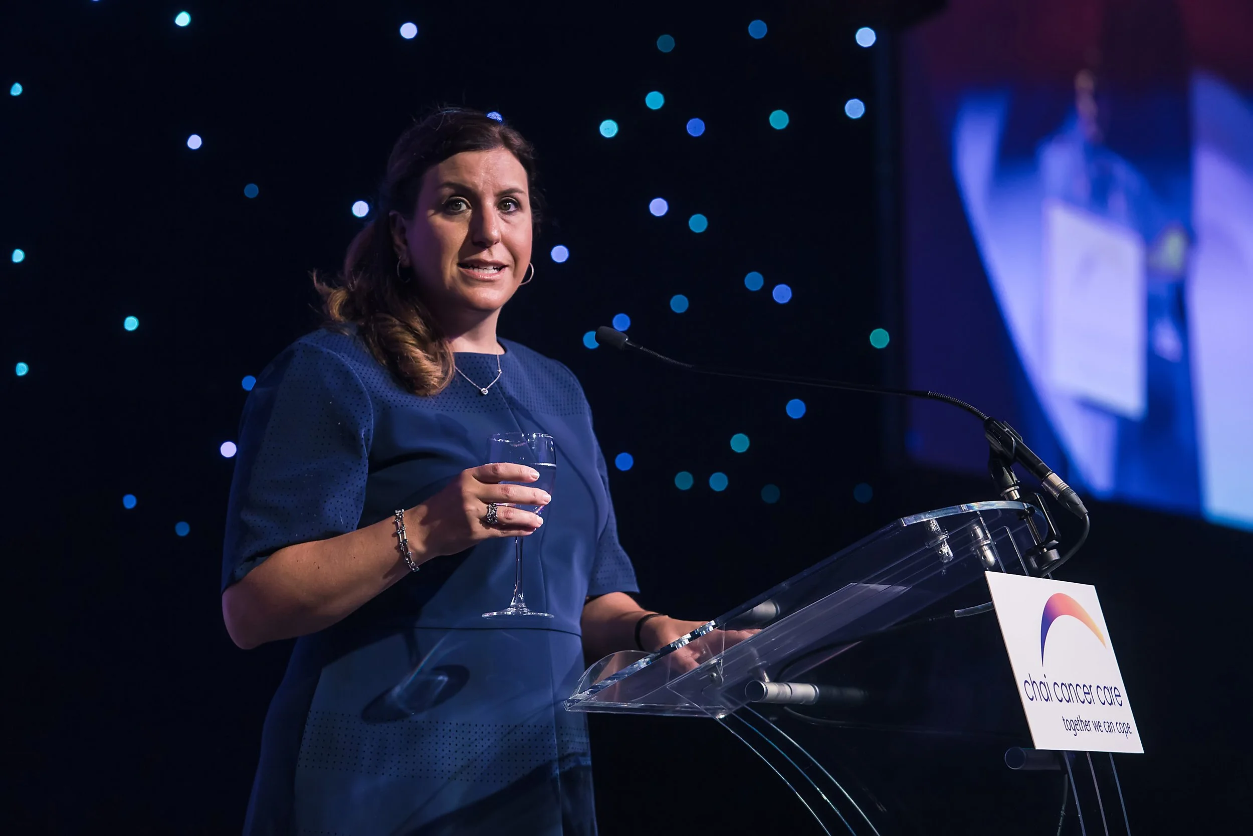Keynote speaker addressing delegates at a business conference